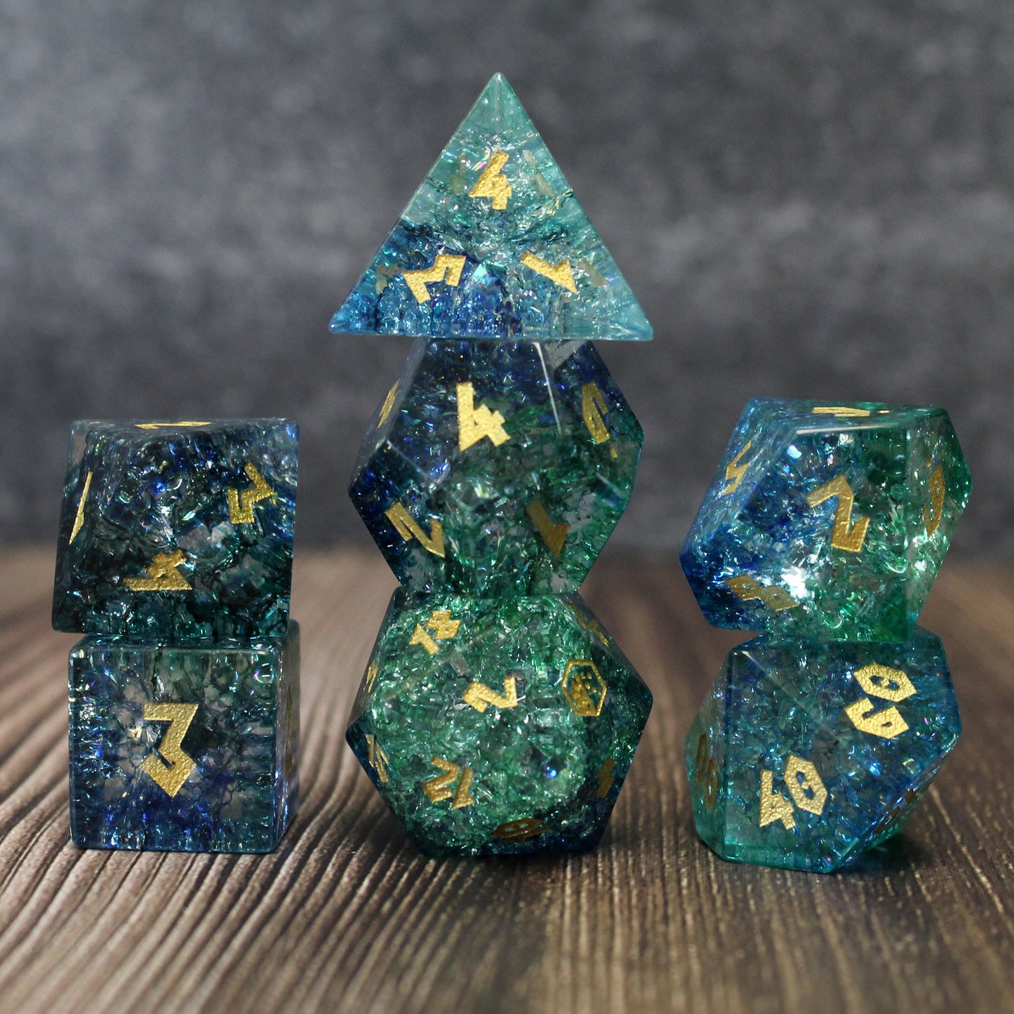 Stacked dice set in darker light, highlighting shifting colors like sea currents for RPG enthusiasts.