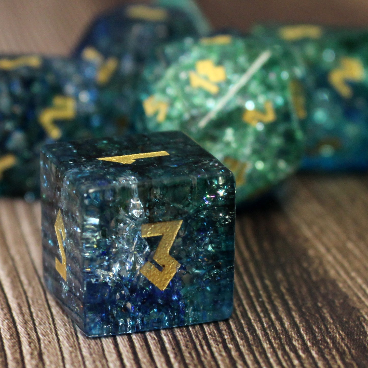 Close-up of the D6 die from the Arctic Wave Shattered Glass Dice Set, showcasing ice-like colors for tabletop RPGs.