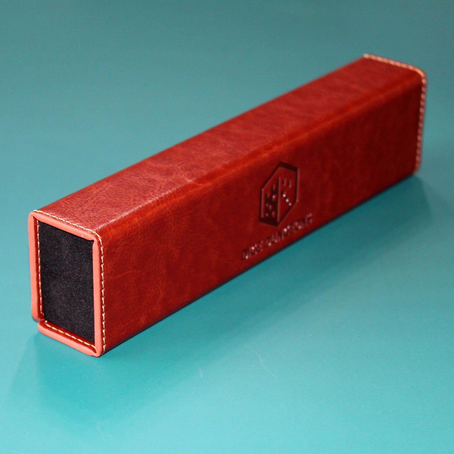 Closed Brown PU Leather Rectangular Dice Case, featuring a compact and protective design with magnets to keep the lid securely closed.