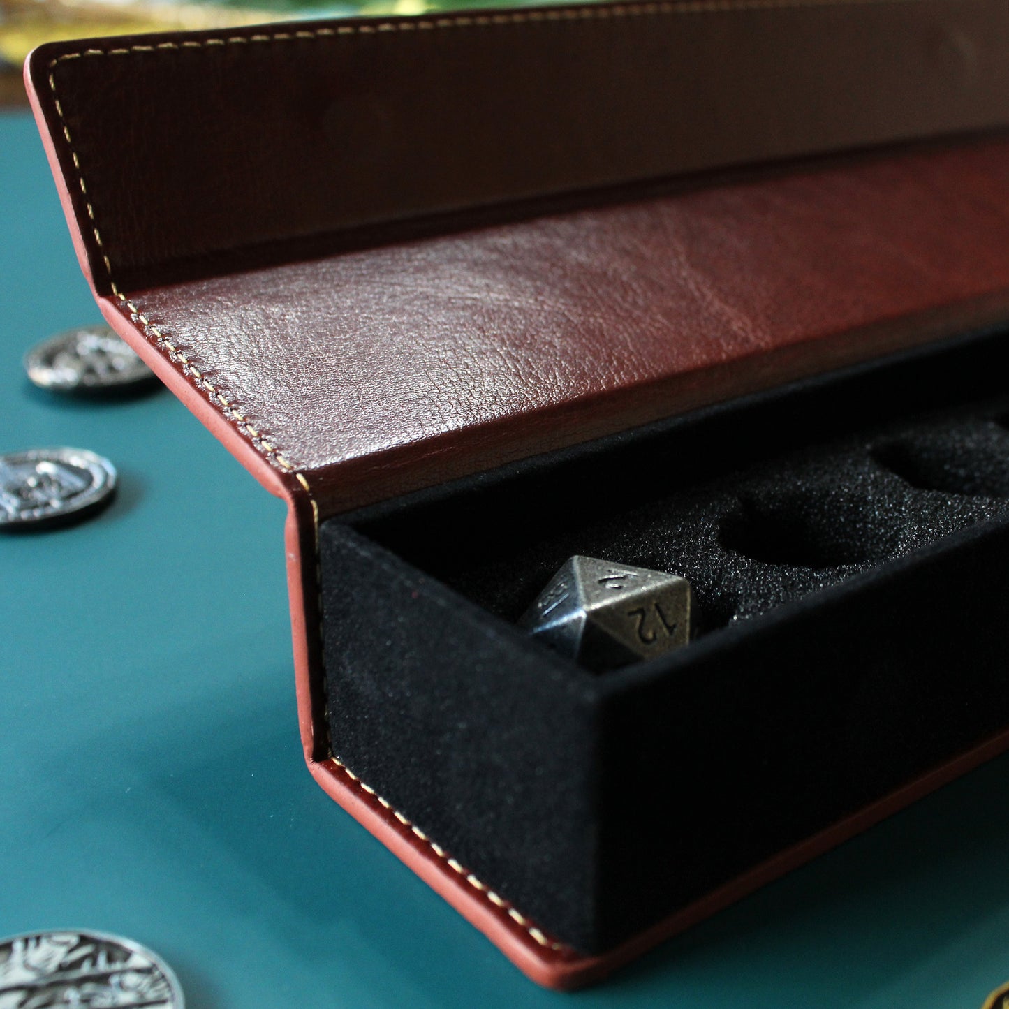 Side view of the Brown PU Leather Rectangular Dice Case, highlighting the soft foam interior with individual cutouts for holding dice securely in place.