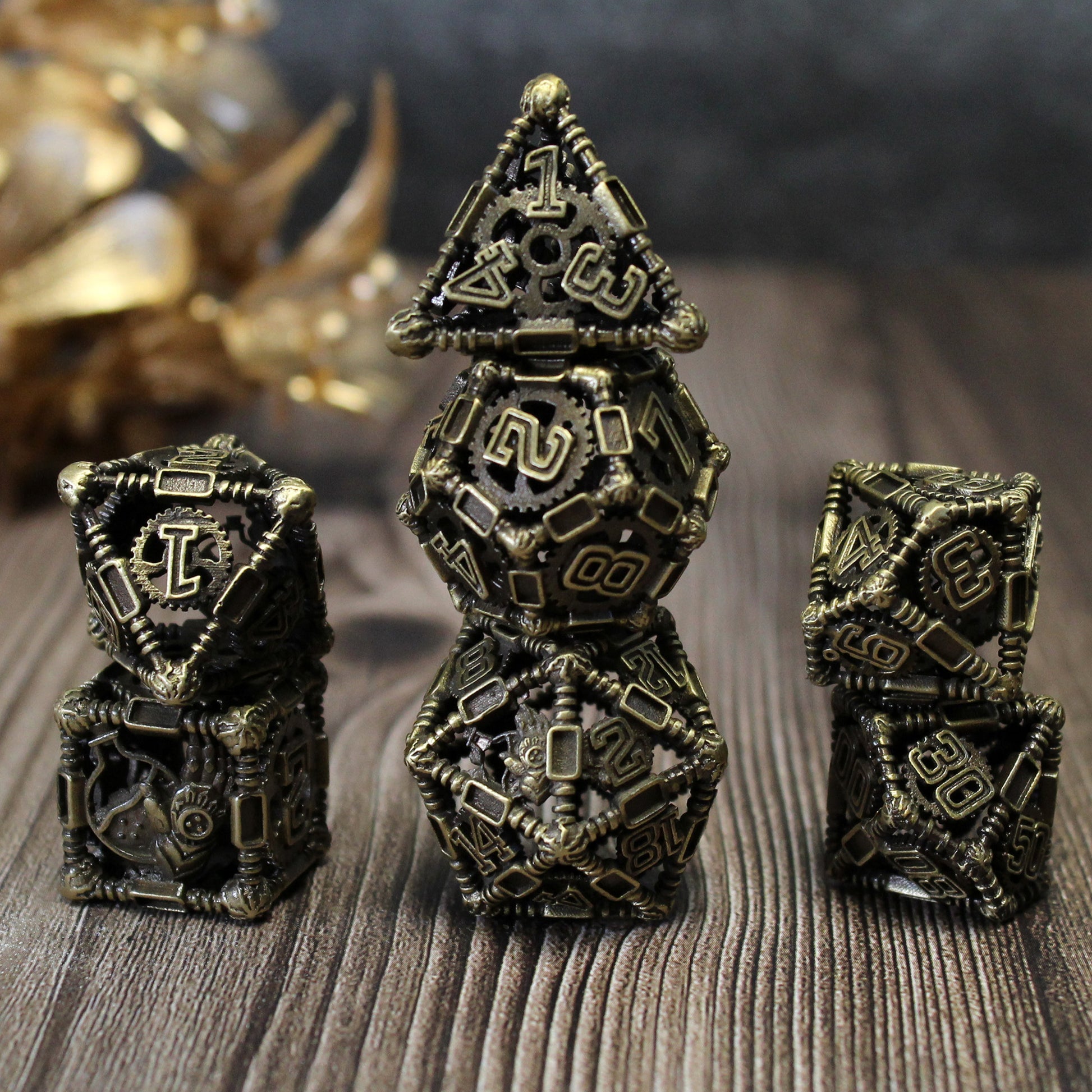 All 7 bronze dice piled up in 3 stacks. Two dice in first stack, three dice in second stack, two dice in third stack. All on a wood  paneled surface with gold decorations in the background.