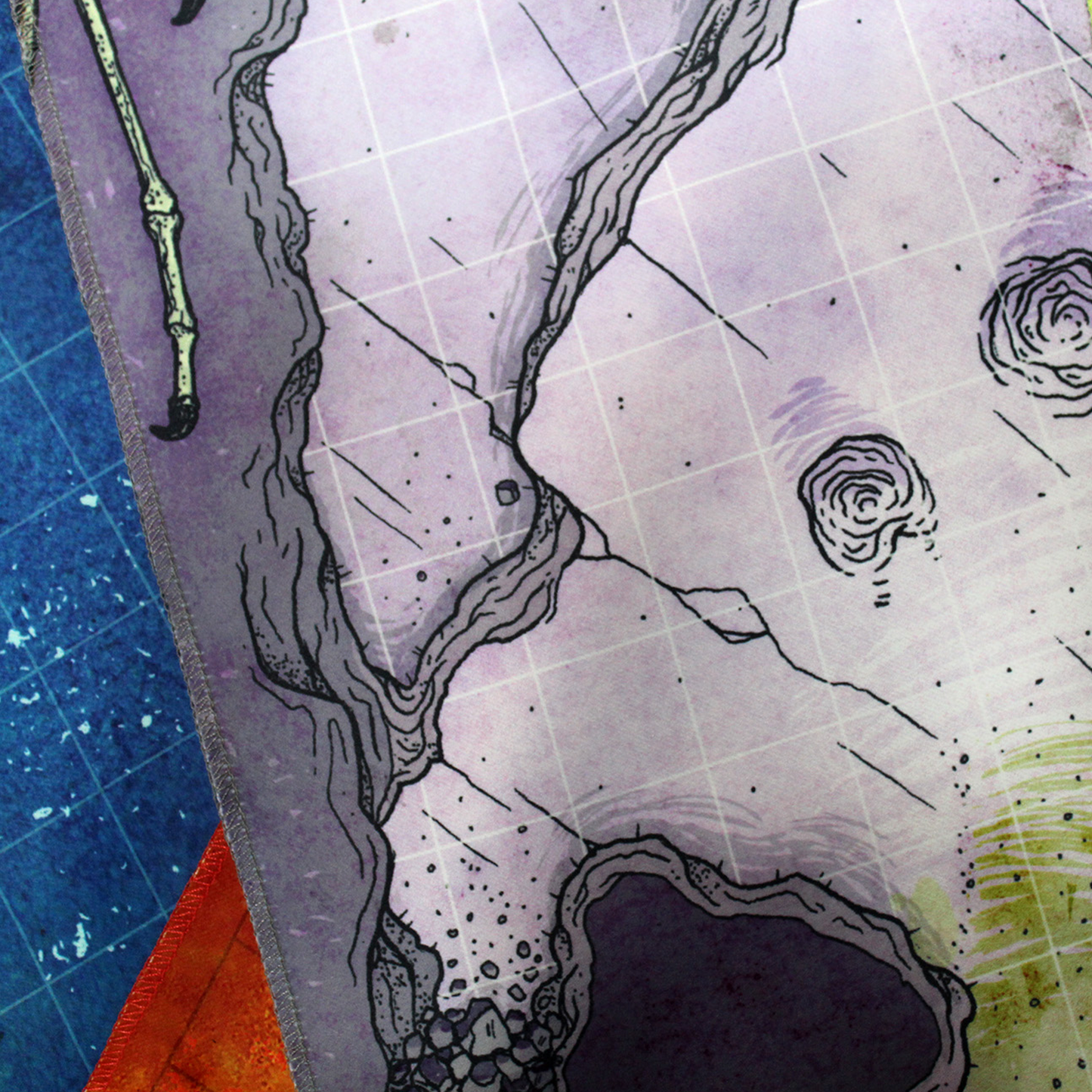Closeup photo of the edge of a cave battle map