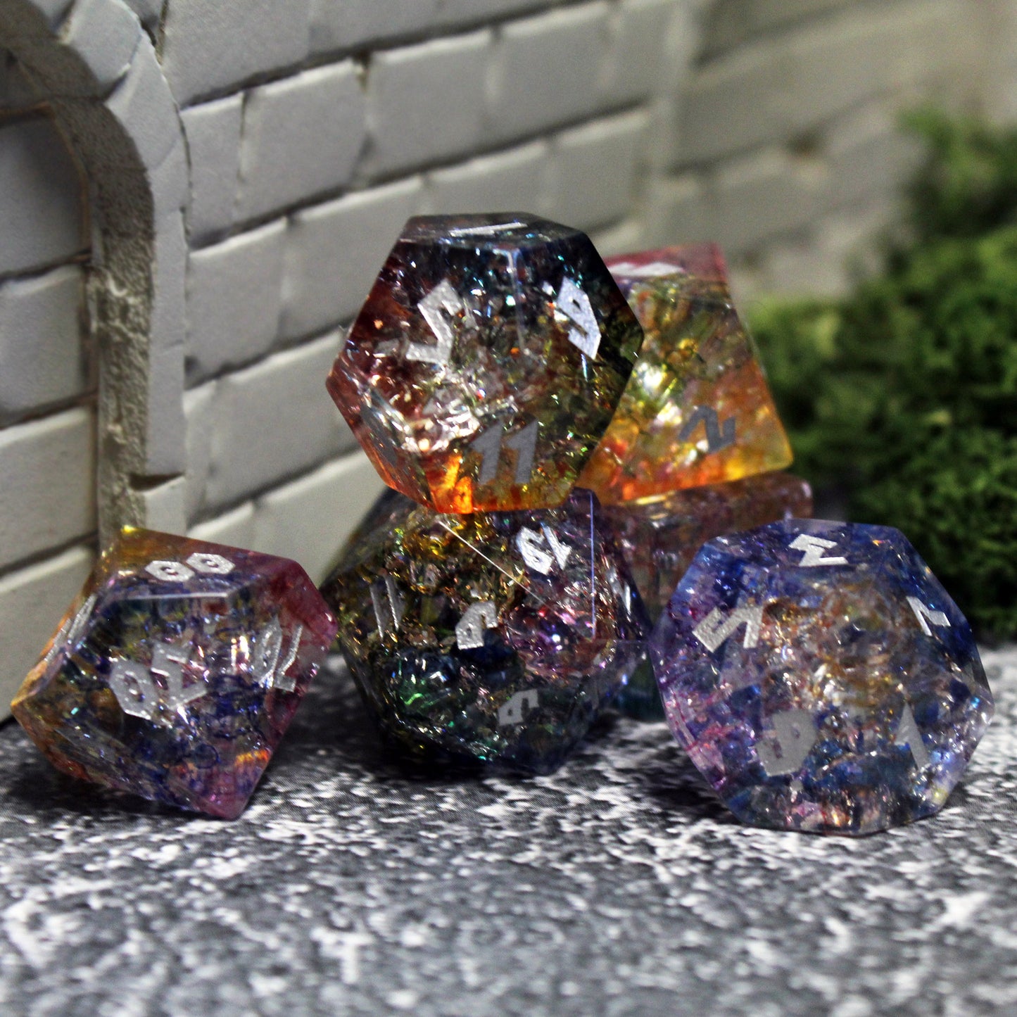 Shattered glass dice set on a gaming table, highlighting durable design for everyday play in Dungeons and Dragons.