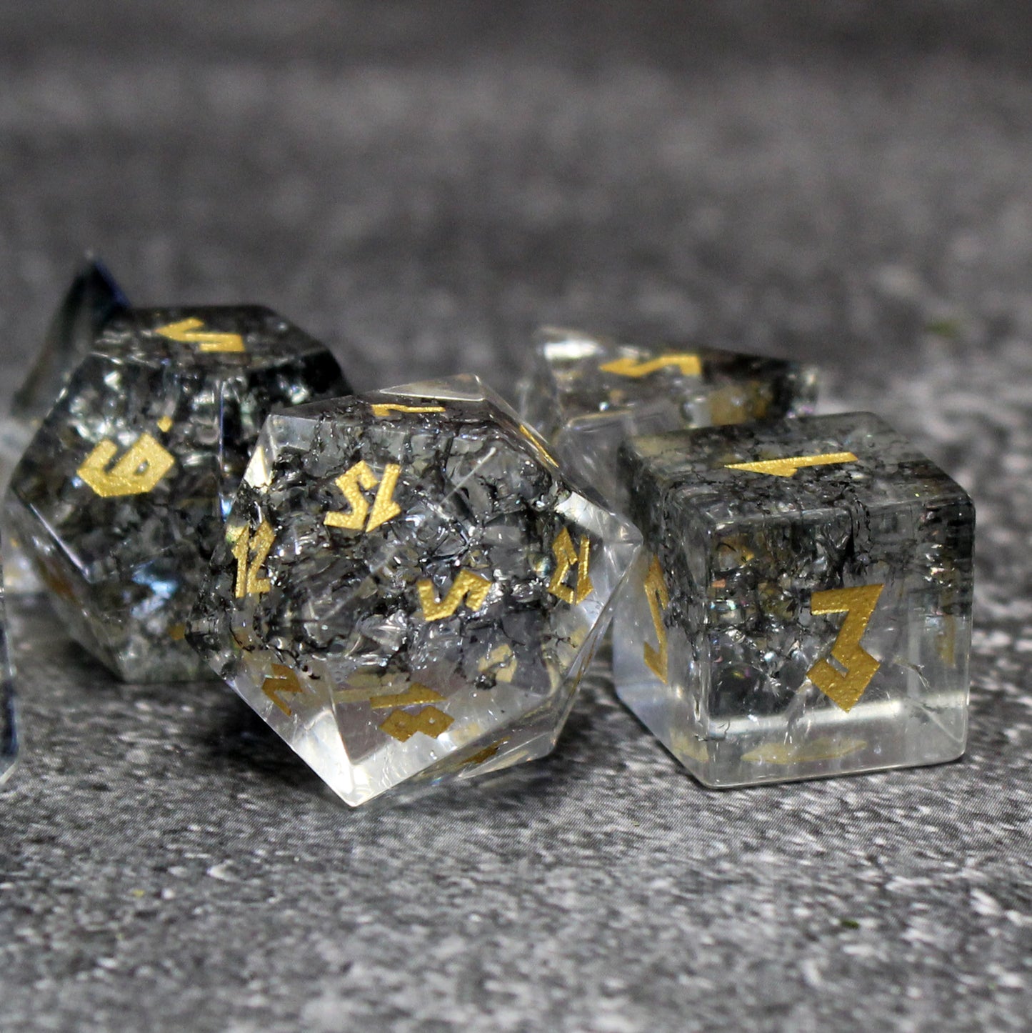 Dice set showcasing the cracked glass that appears to glow, ideal for Dungeons and Dragons sessions.