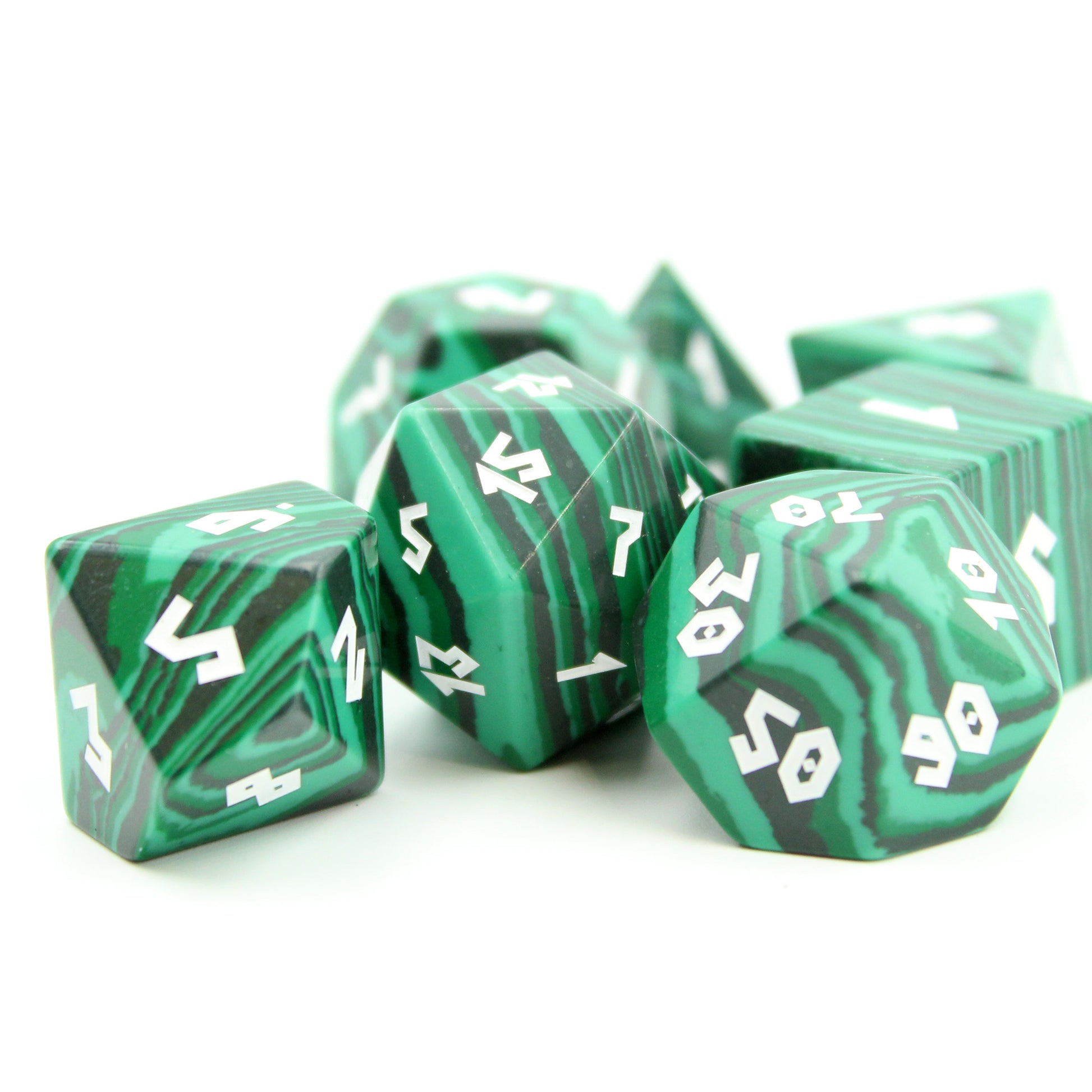 Dice set under bright light, revealing vibrant green hues and repeating linear patterns ideal for enhancing your RPG sessions.