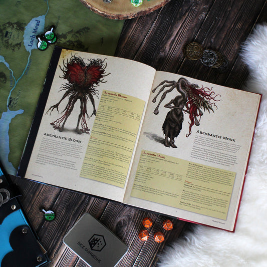 Open Mutated Monsters book on a white background, displaying a section of unique creatures with detailed descriptions and artwork.