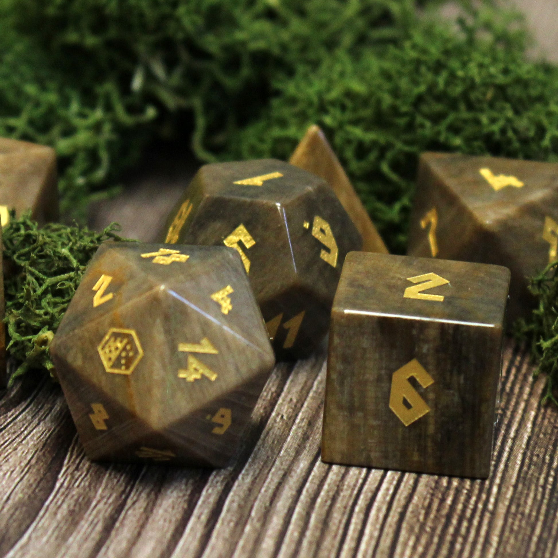 Petrified wood dice set displayed on wooden table, bringing a touch of the wilderness to your Dungeons and Dragons sessions.