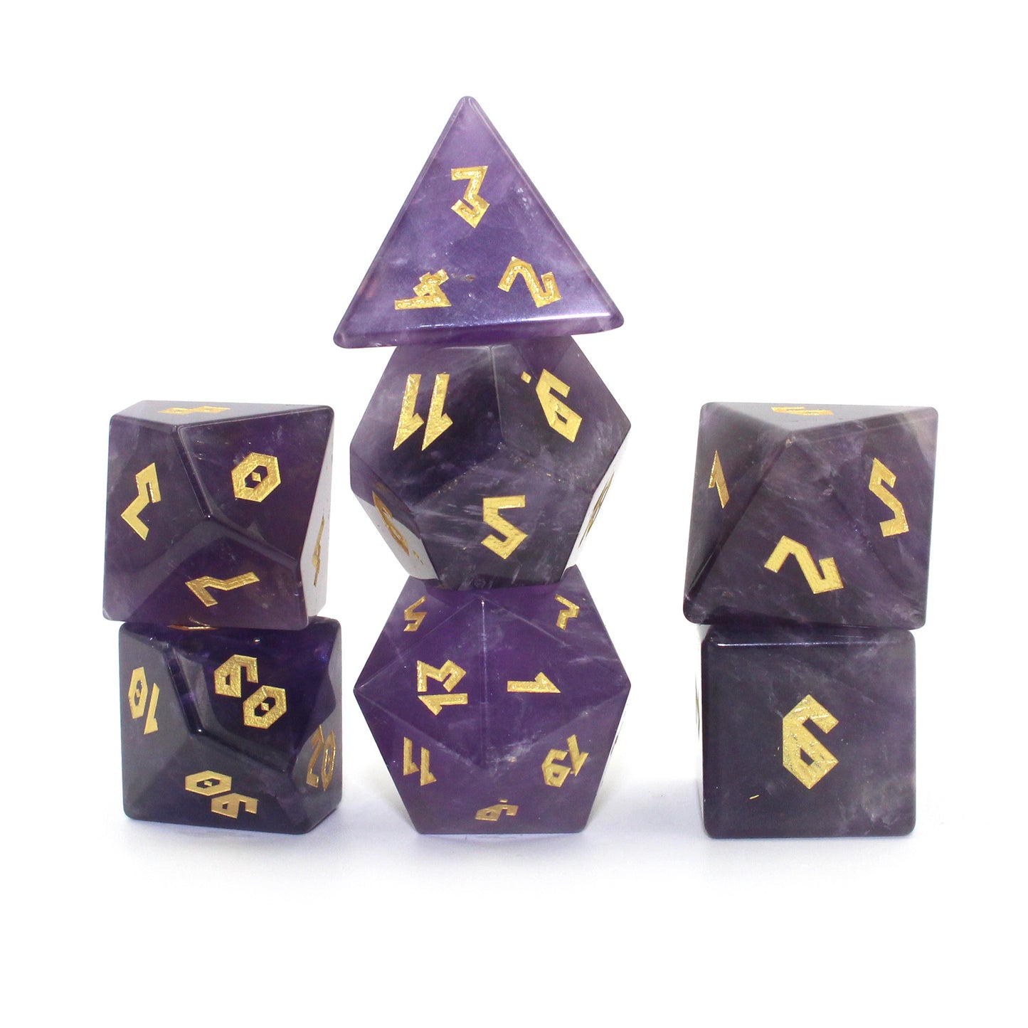 Stacked Amethyst dice set on a white background, featuring the luxurious purple stones and gold numbering in a Roman font.