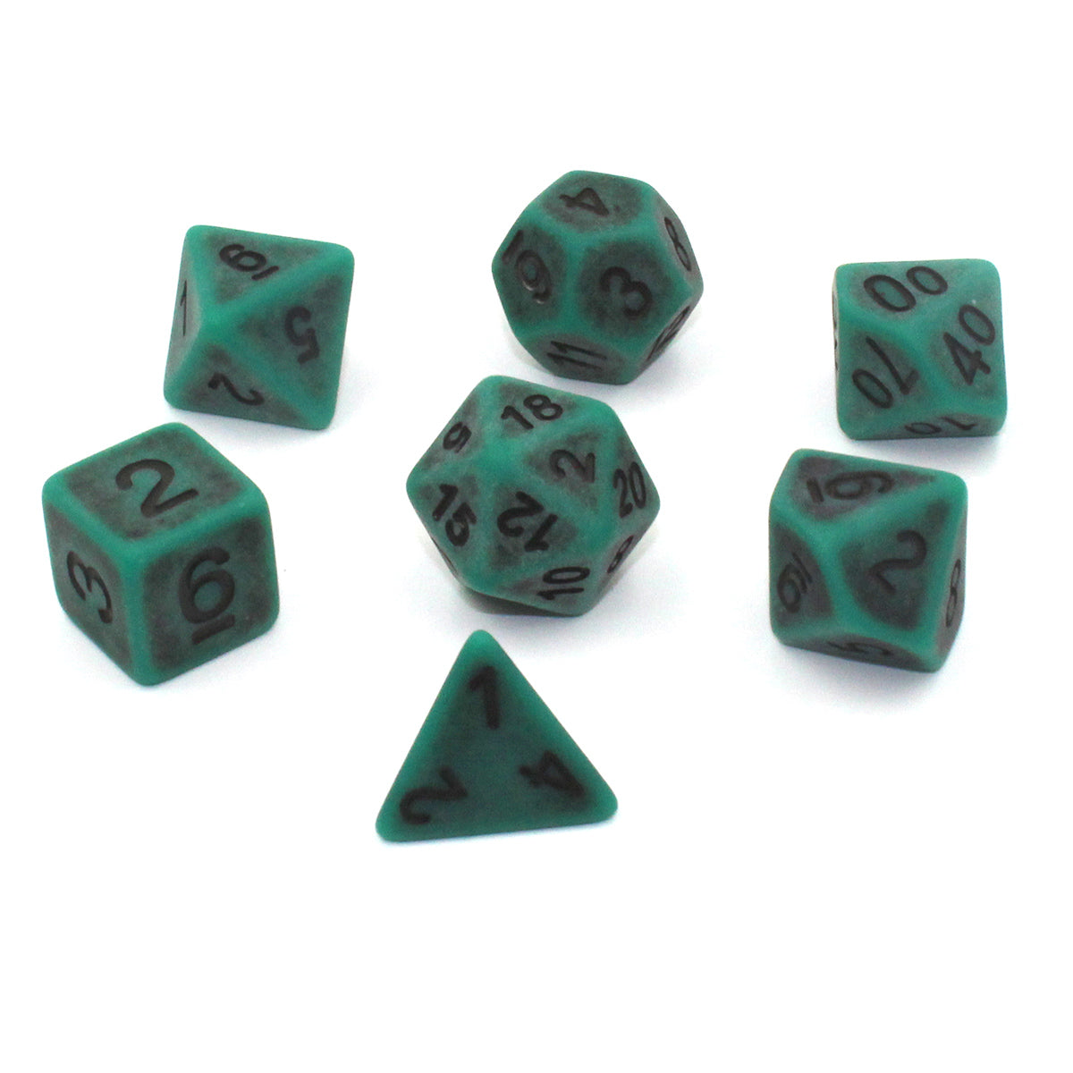Set of seven green plastic dice with black numbering designed to look aged on a white background