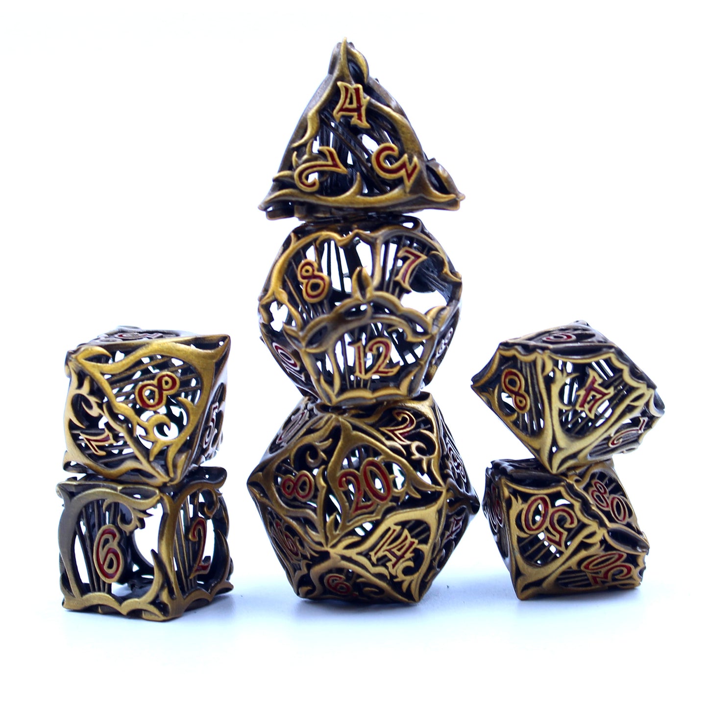 Stacked Set of seven bronze bard-inspired hollow metal dice with red numbering and a hard on each die face on a white background
