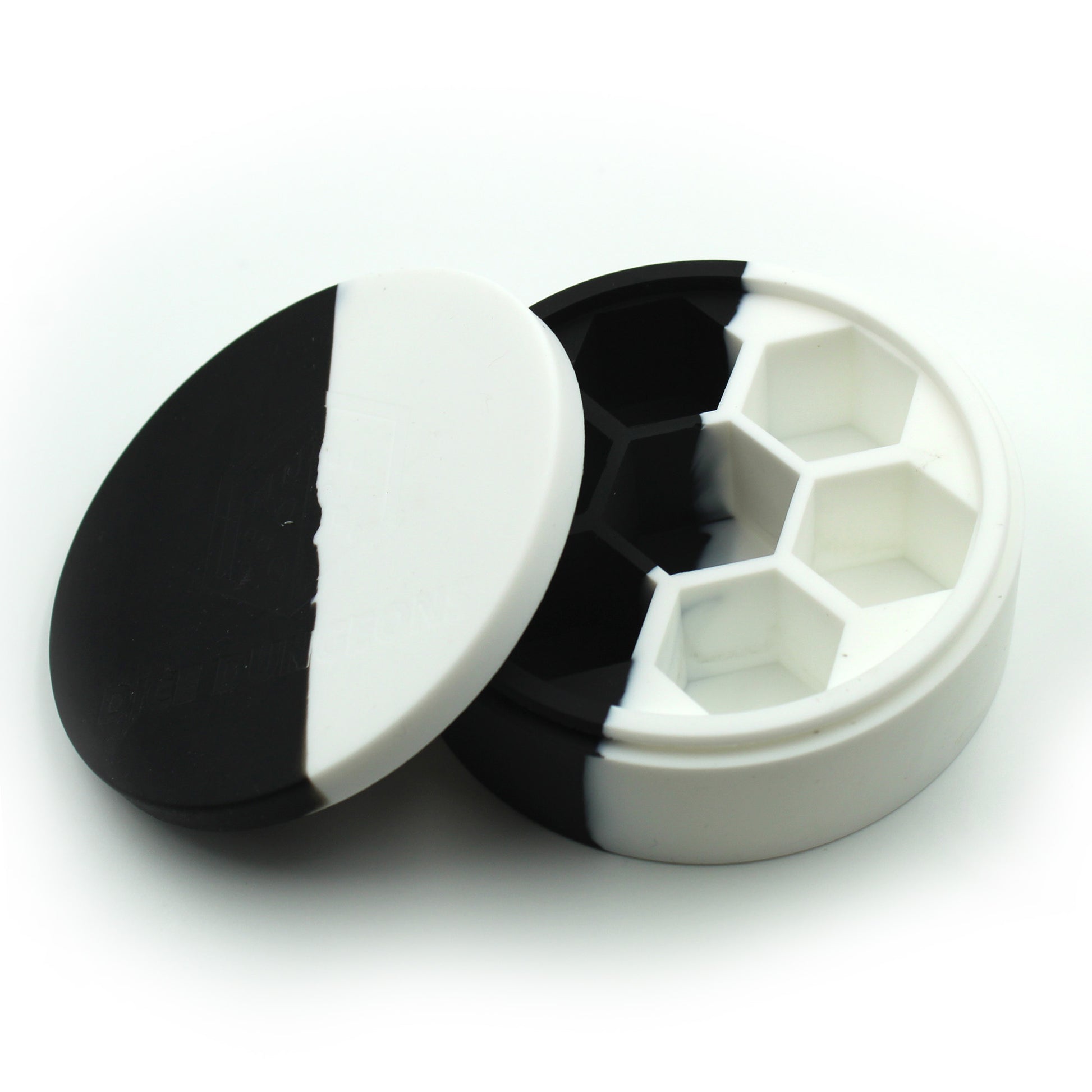 Open Silicone Round Dice Case on a white background, showing compartments for a 7-piece dice set, made from sturdy cast silicone.