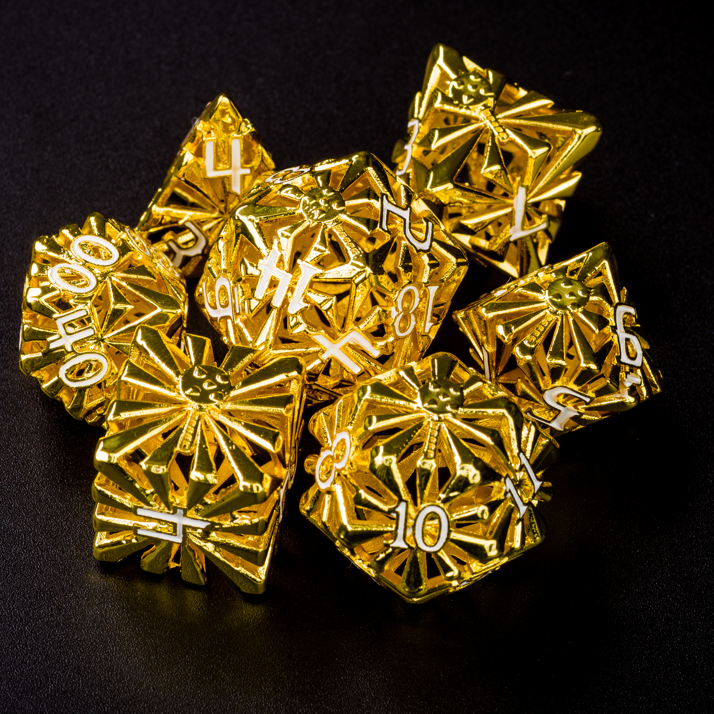 set of seven bright gold-colored cleric-inspired hollow metal dice with white numbers and a mace in place of the high number on each die on a black background
