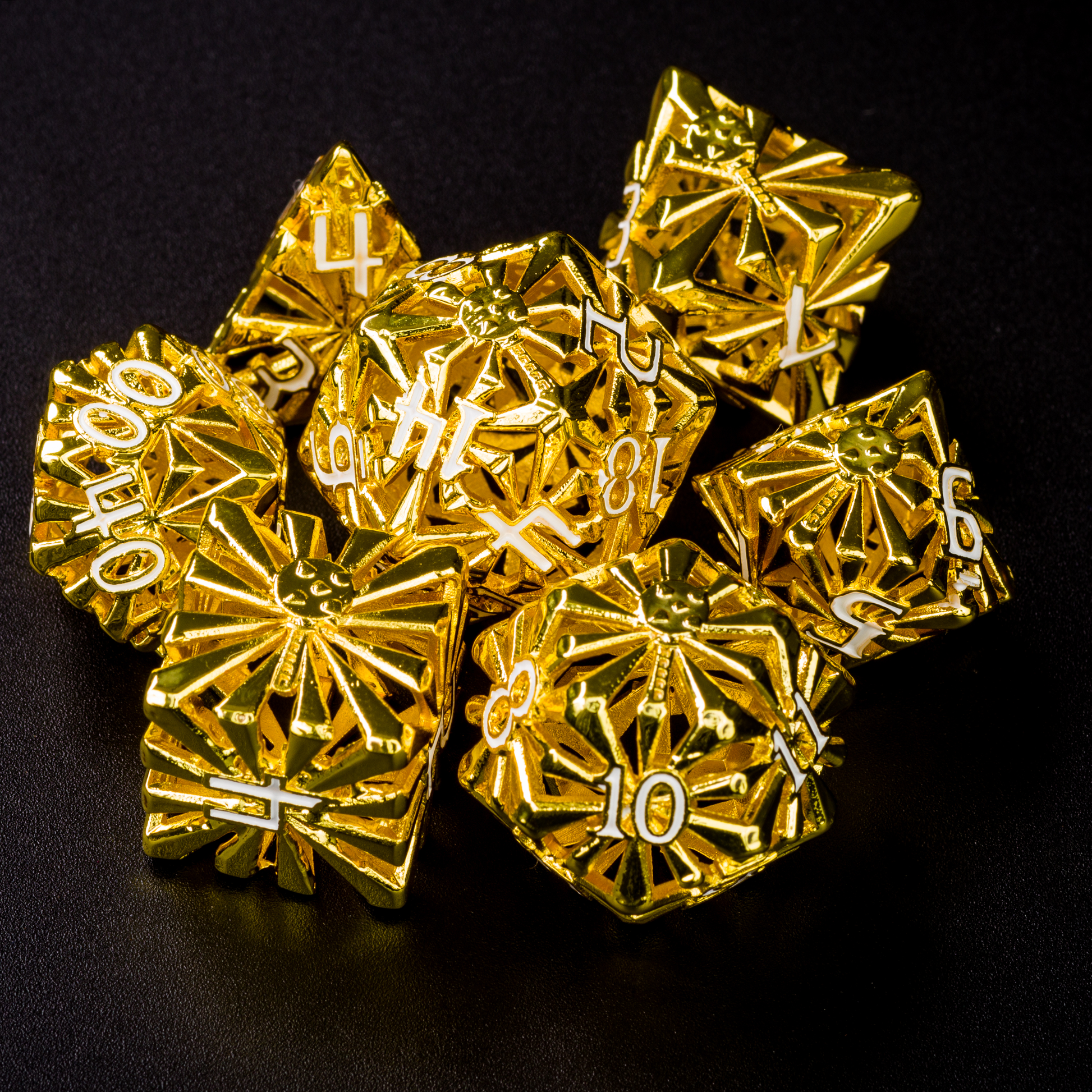 set of seven bright gold-colored cleric-inspired hollow metal dice with white numbers and a mace in place of the high number on each die on a black background