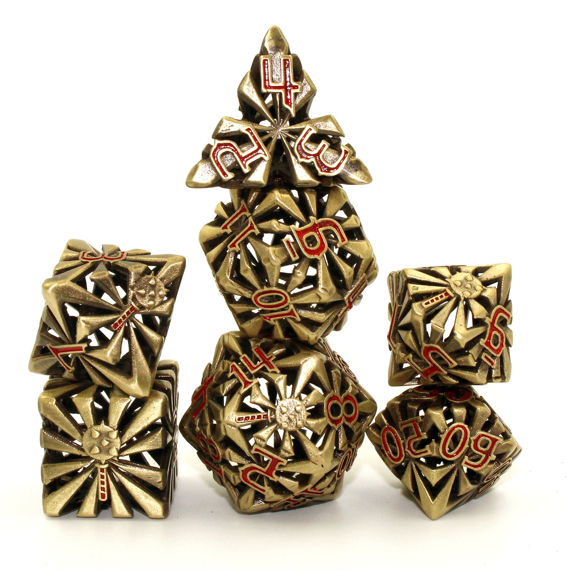Stacked set of seven gold-colored cleric-inspired hollow metal dice with red numbers and a mace in place of the high number on each die