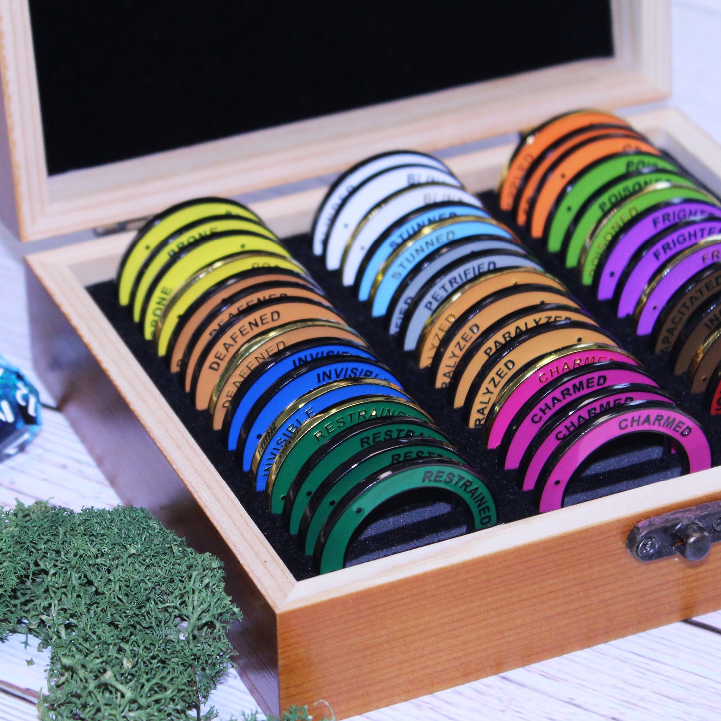 Open Condition Ring Box with condition rings inside, highlighting the deep storage holes designed to keep dnd condition rings safe and organized.