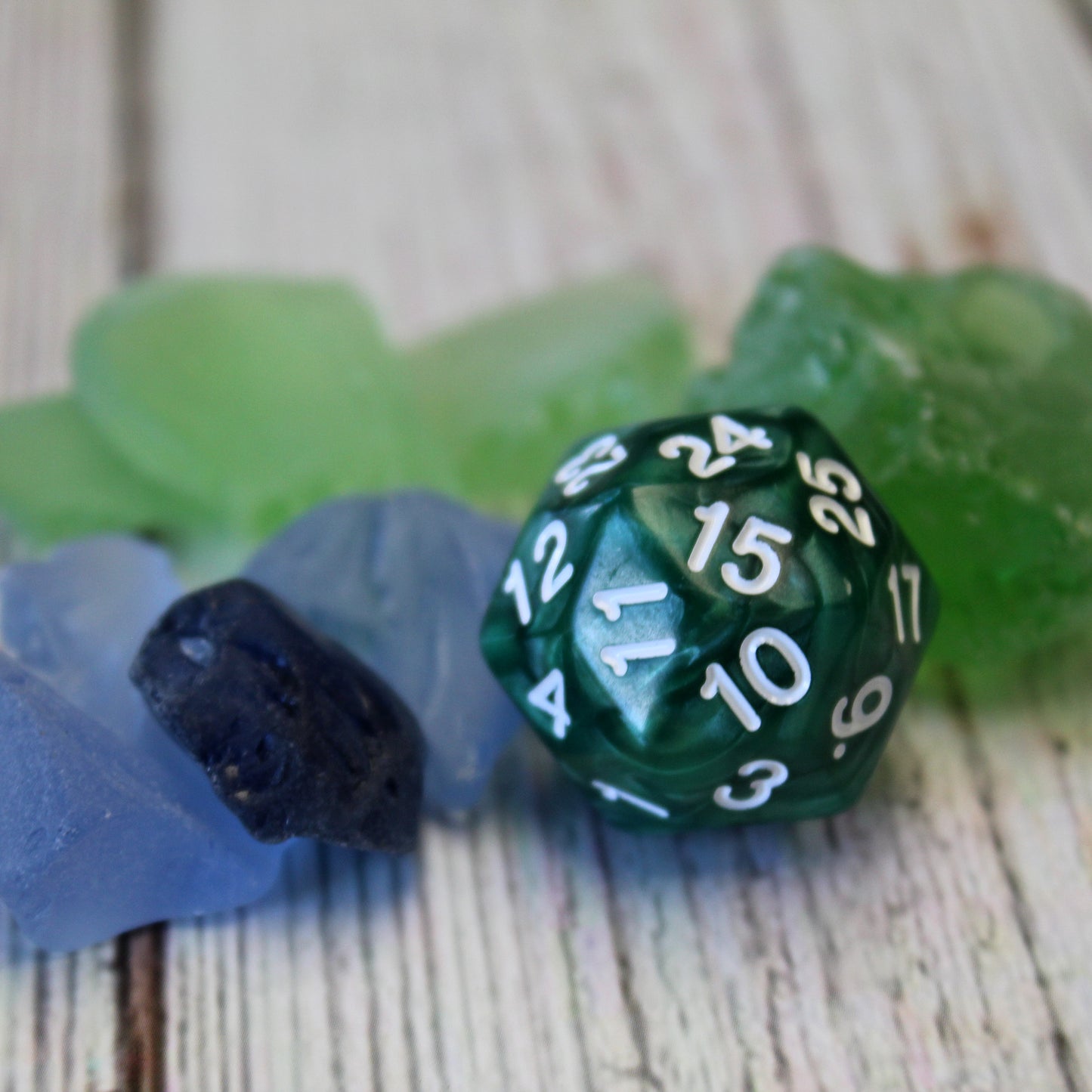 Close-up of Green Pearl D30 dice, highlighting its 30-sided design, perfect for adding homebrew twists to RPG campaigns.