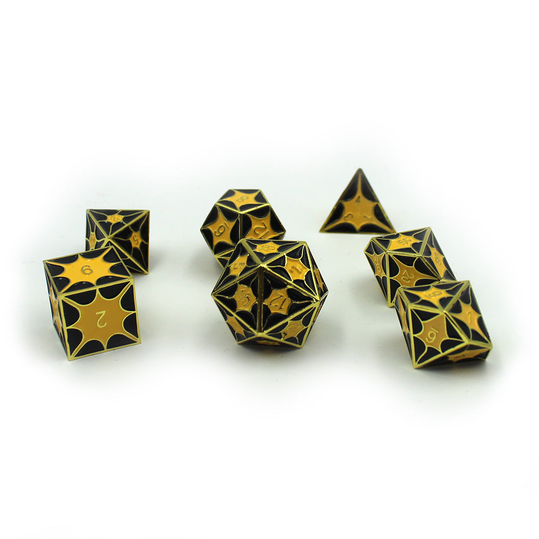 Gold metal dice with enamel inset as dragon scales - enamel is black and yellow.