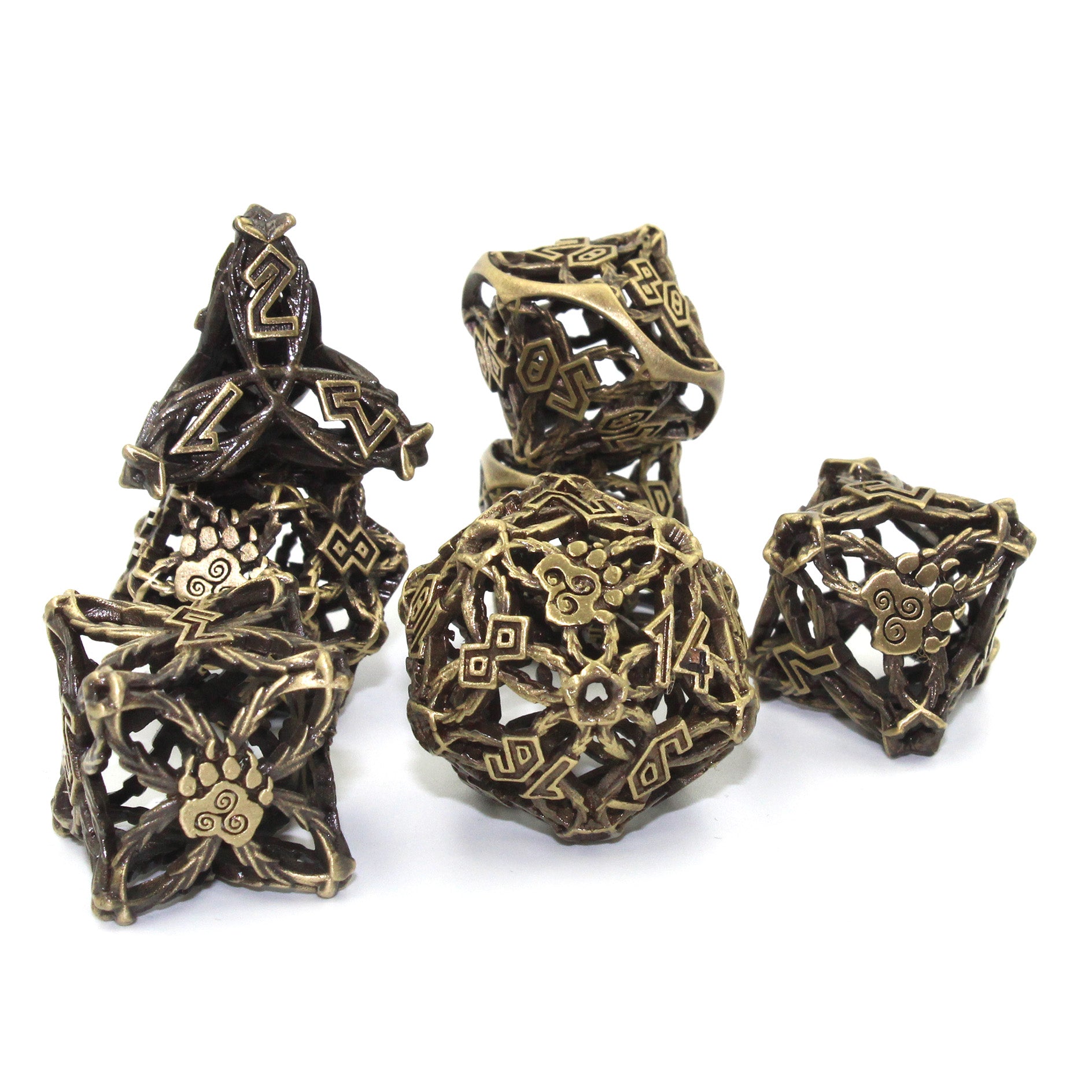 set of bronze druid-inspired hollow metal RPG dice with uninked numbers and a glyph-covered paw in place of the high number on a white background