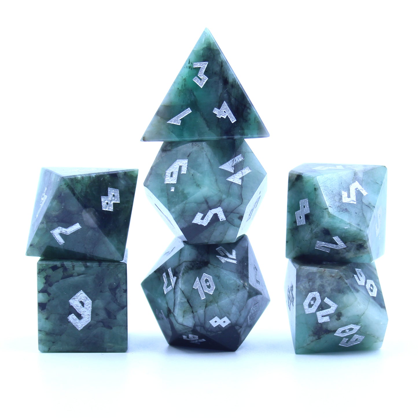 Emerald dice set on a white background, featuring real raw emerald gemstones with silver color numbering, perfect for collectors and RPG players alike.