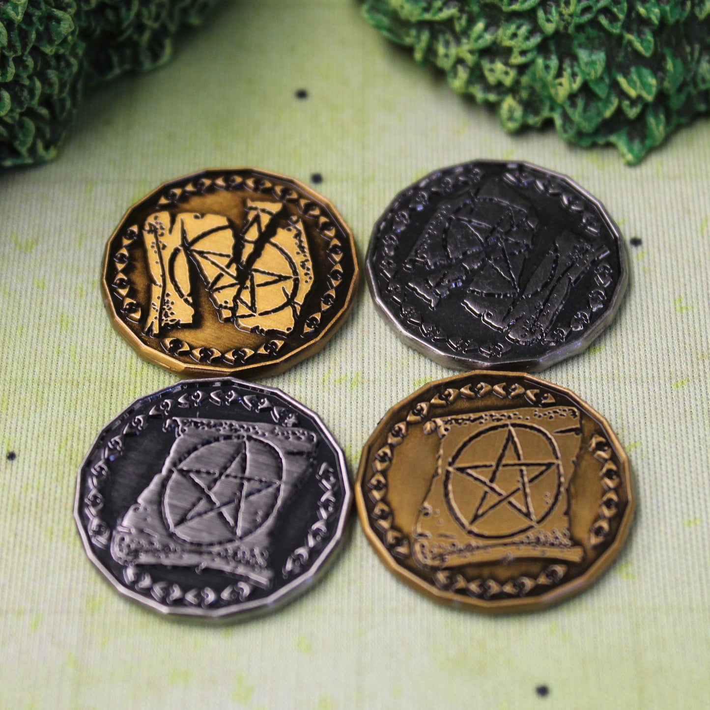 Close Up of Gold and Silver Warlock Tokens, Heads and Tails Sides Showing, on a Battle Map
