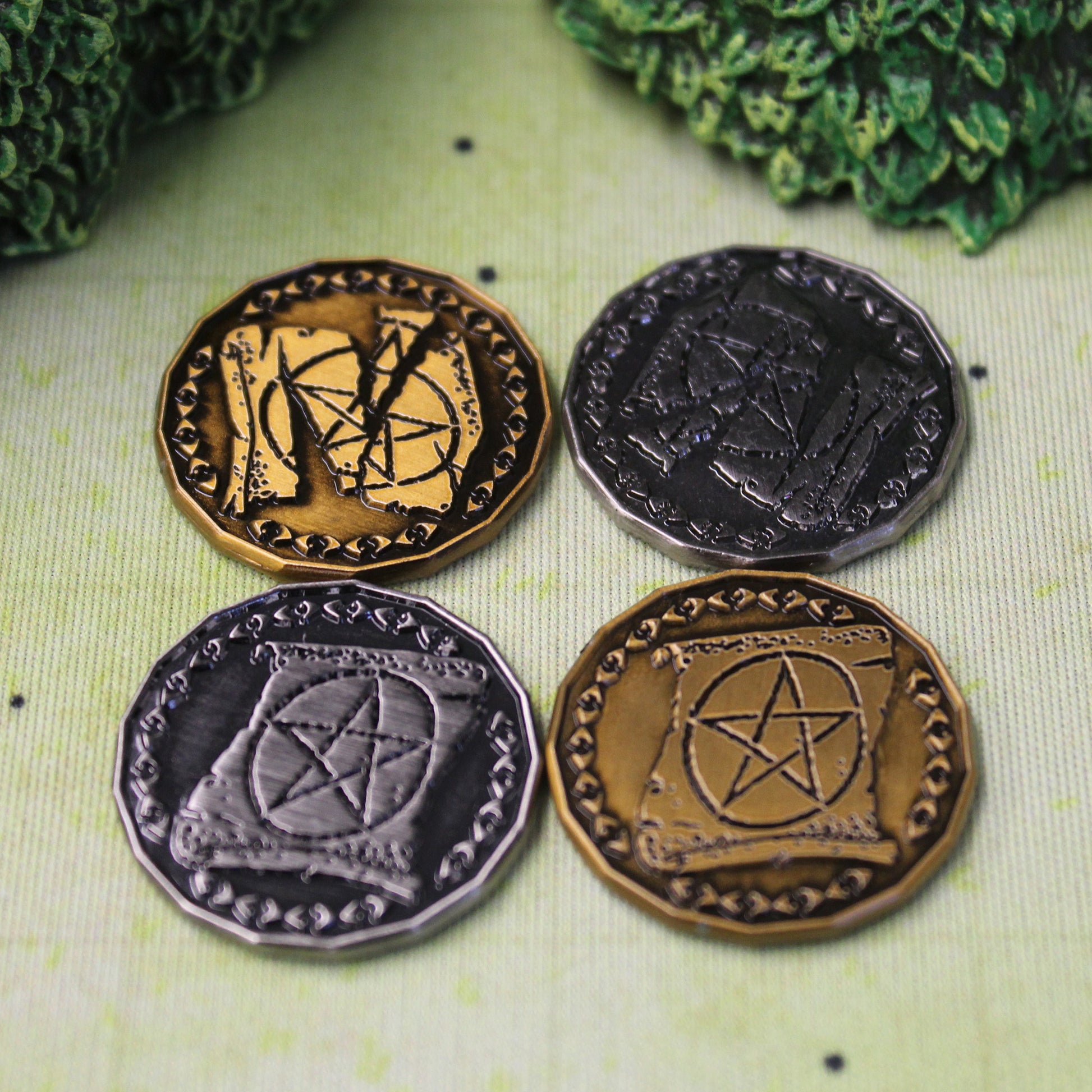 Close Up of Gold and Silver Warlock Tokens, Heads and Tails Sides Showing, on a Battle Map