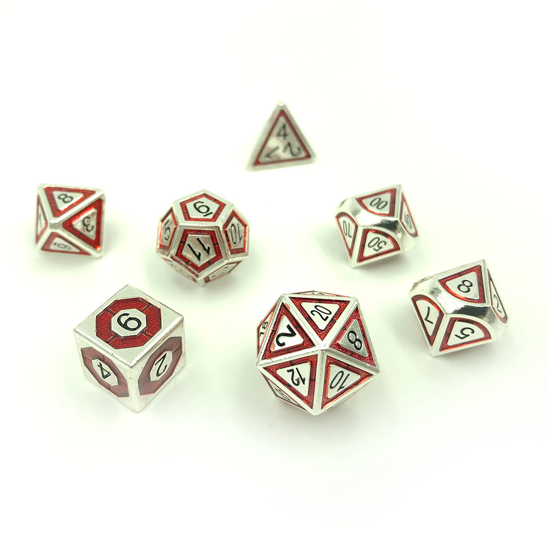 Metal BullsEye Red Dice Set scattered on a white background