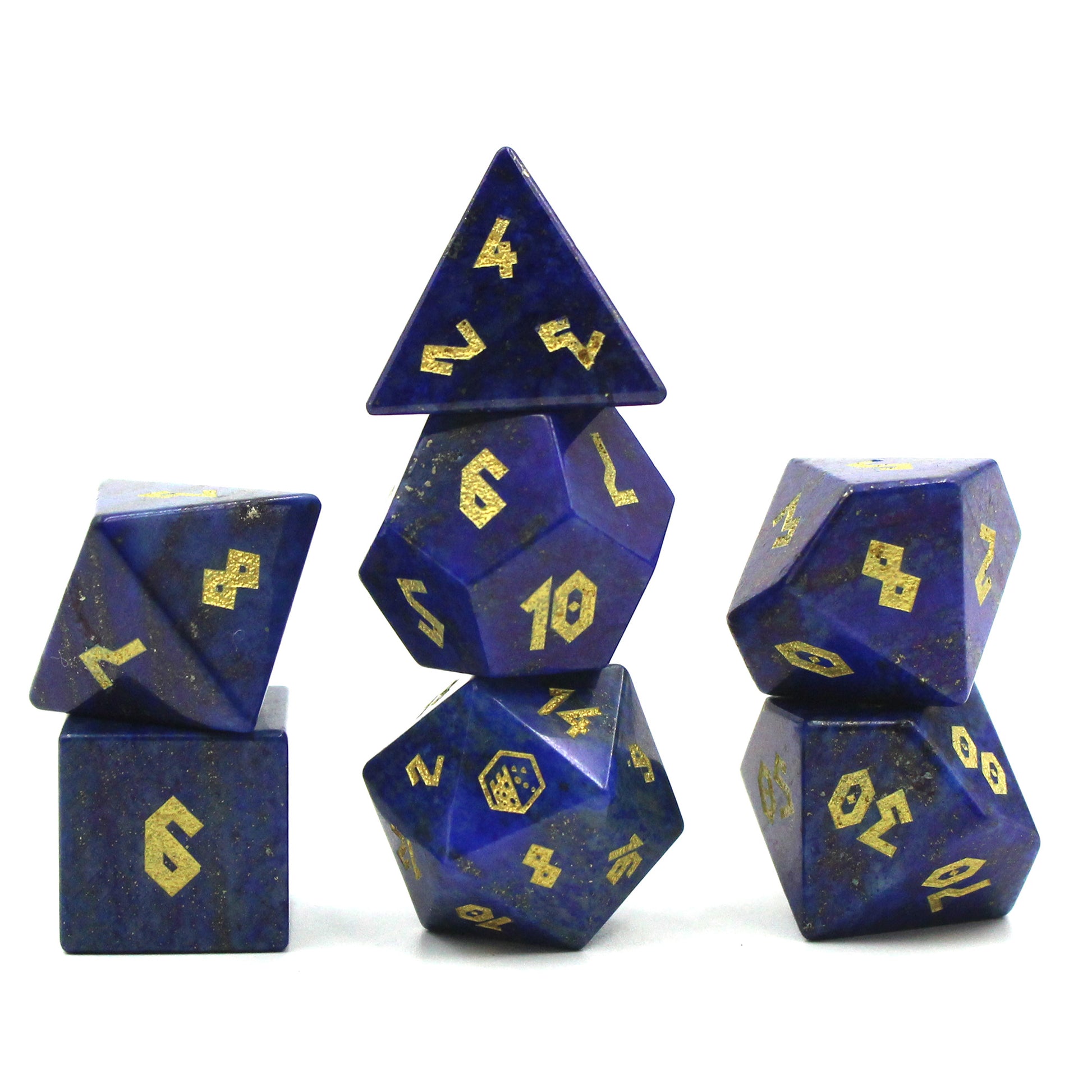 Lapis Lazuli dice set arranged in three stacks on a white background