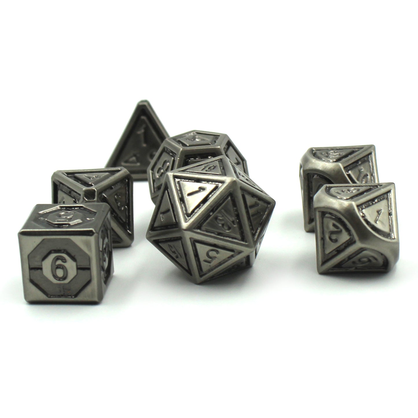Metal Bullseye dice set arranged in a scattered pile on a white background.