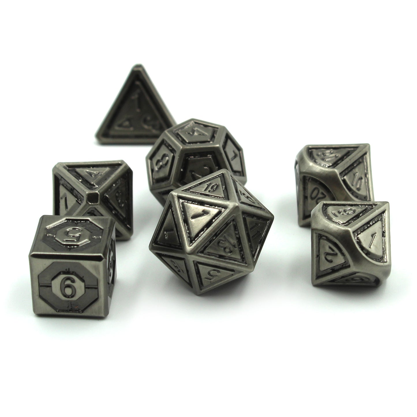Metal Bullseye dice set arranged in a scattered pile on a white background.