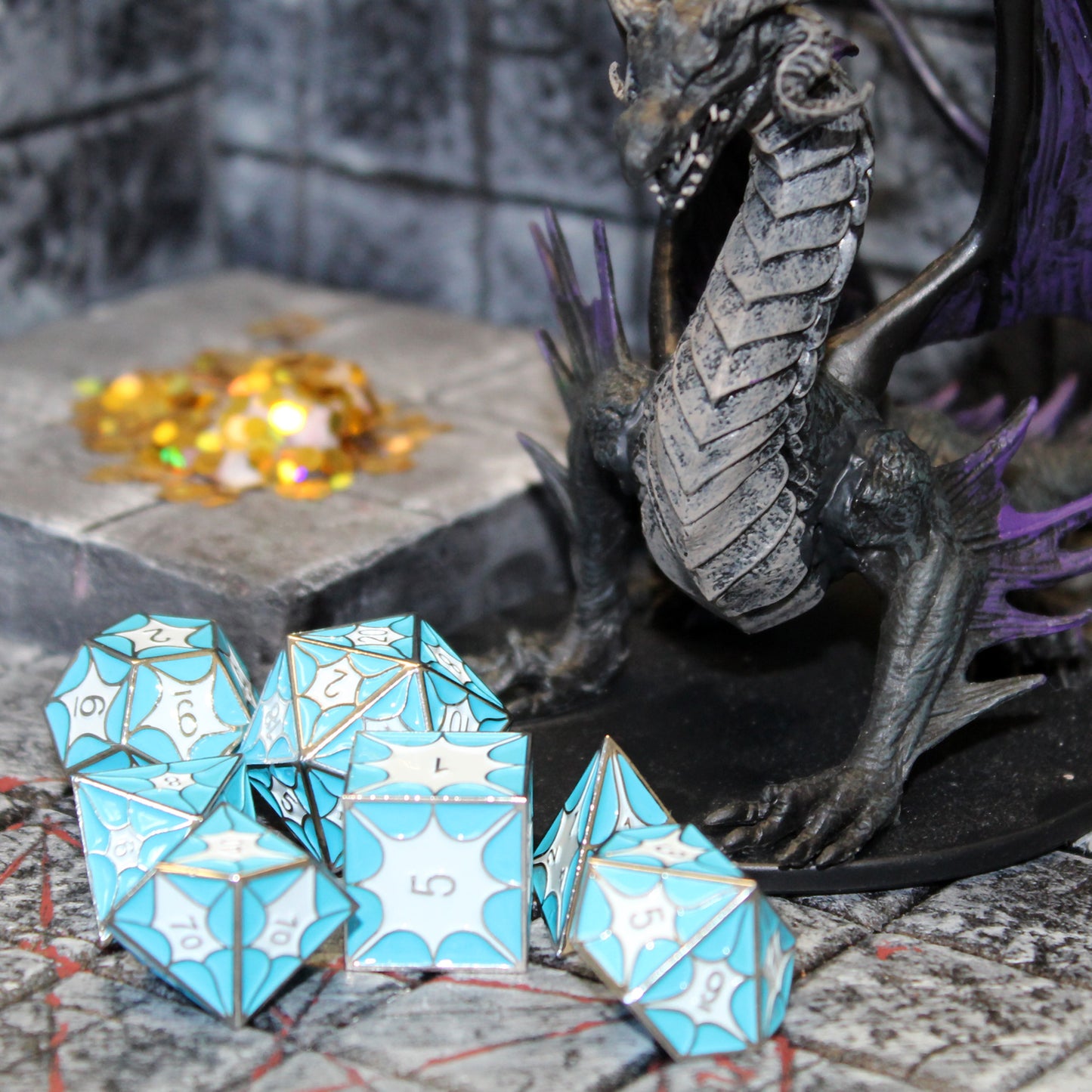 Blue dragon pattern dice set in a dungeon-themed setting, ideal for Dungeons and Dragons.