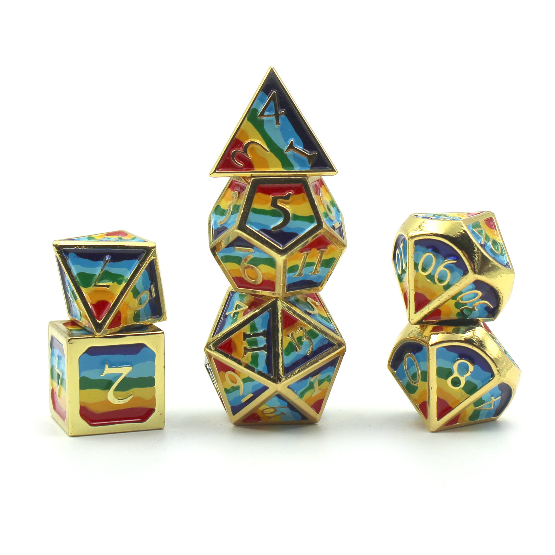 Photograph of stacked rainbow-striped RPG dice with golden numbers and edges on a white background