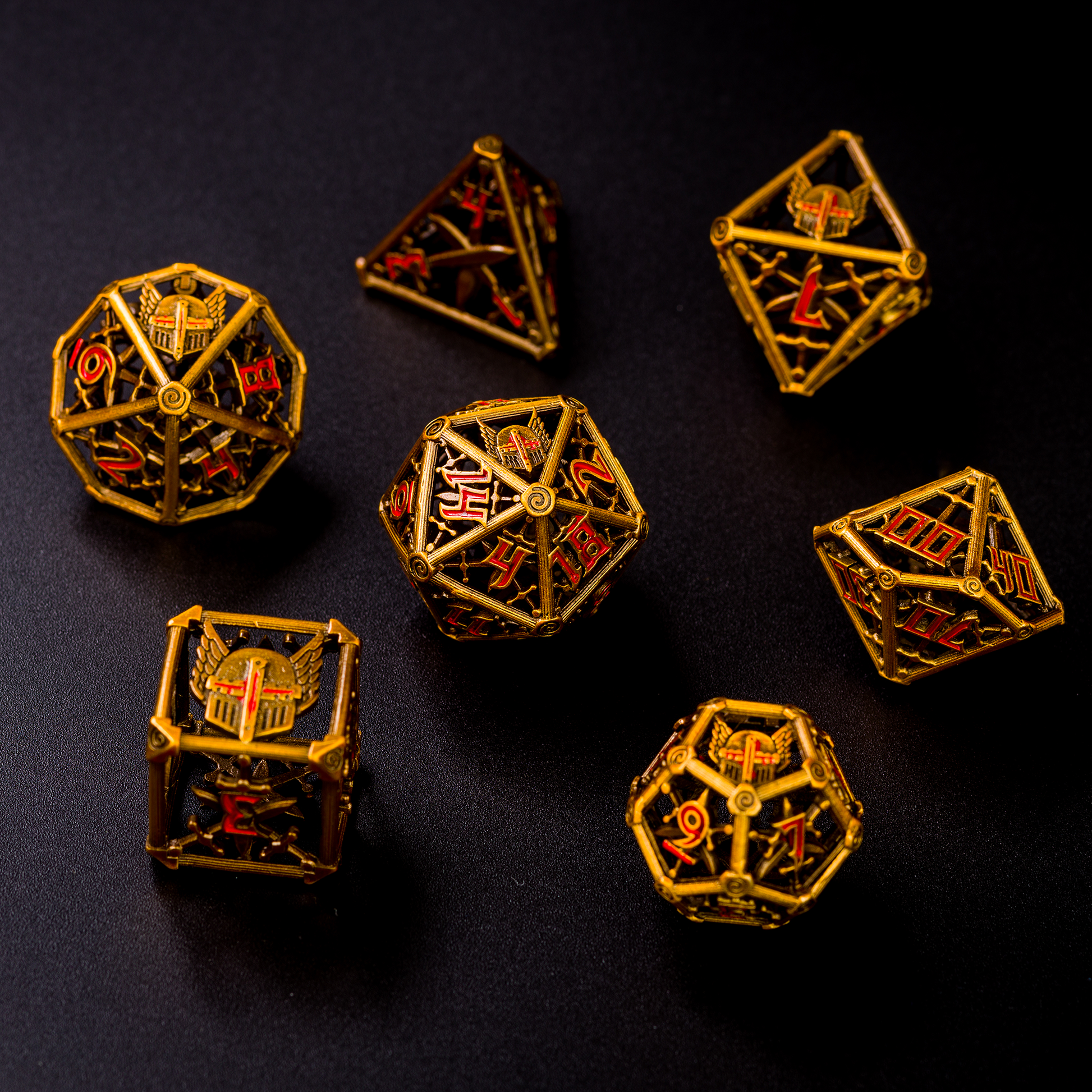 All 7 gold and red dice displayed on a black background. 20 sided die is in the center with the other 6 dice surrounding it in a circle.