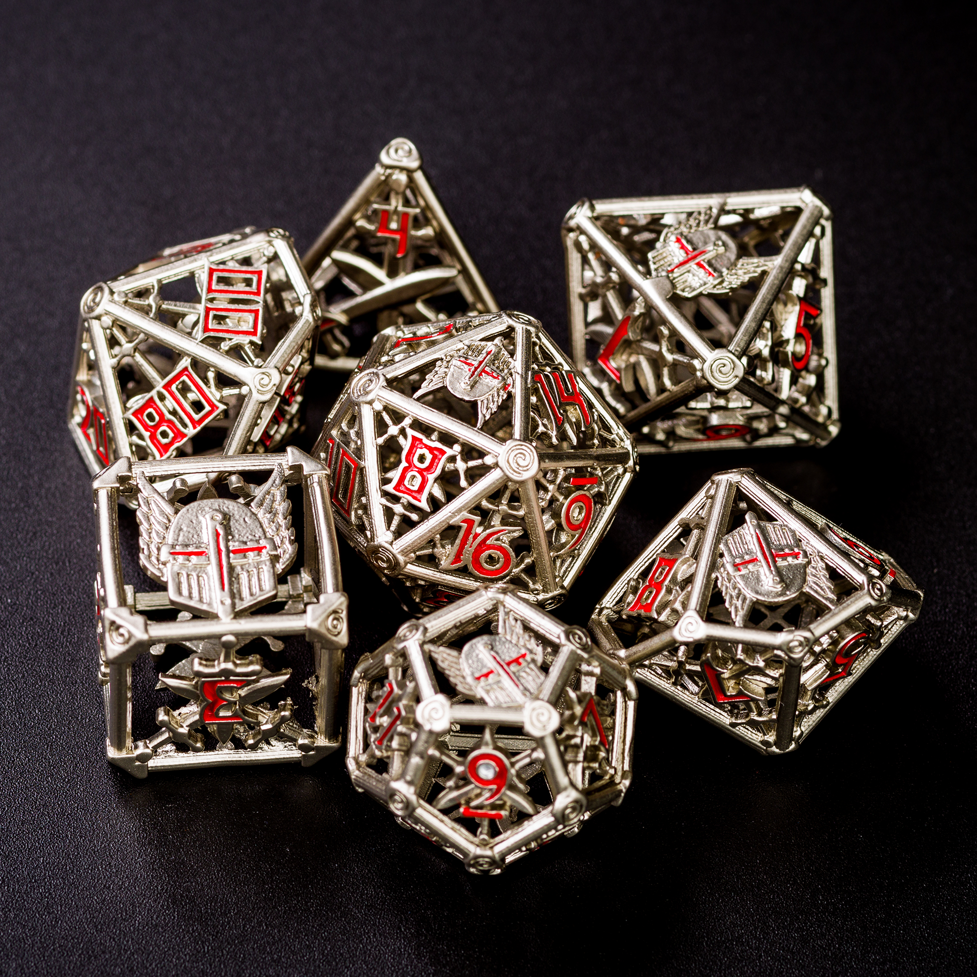 All 7 silver and red dice displayed on a black background