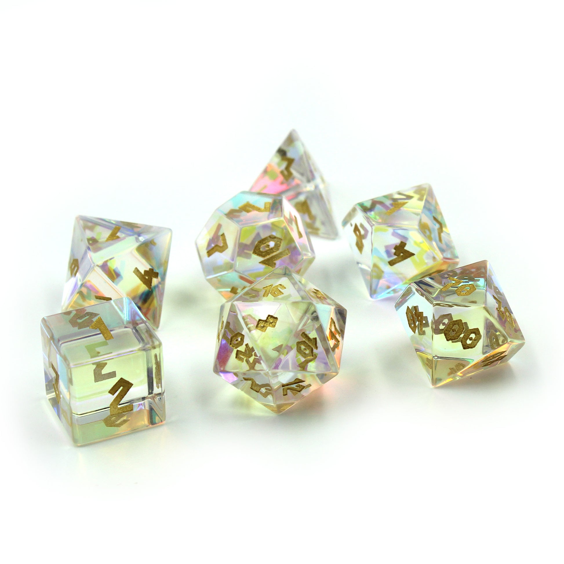 Dice from the Prismatic Glass tabletop RPG dice set arranged on a white surface.  These dice are almost mystical in appearance perfect for many characters.