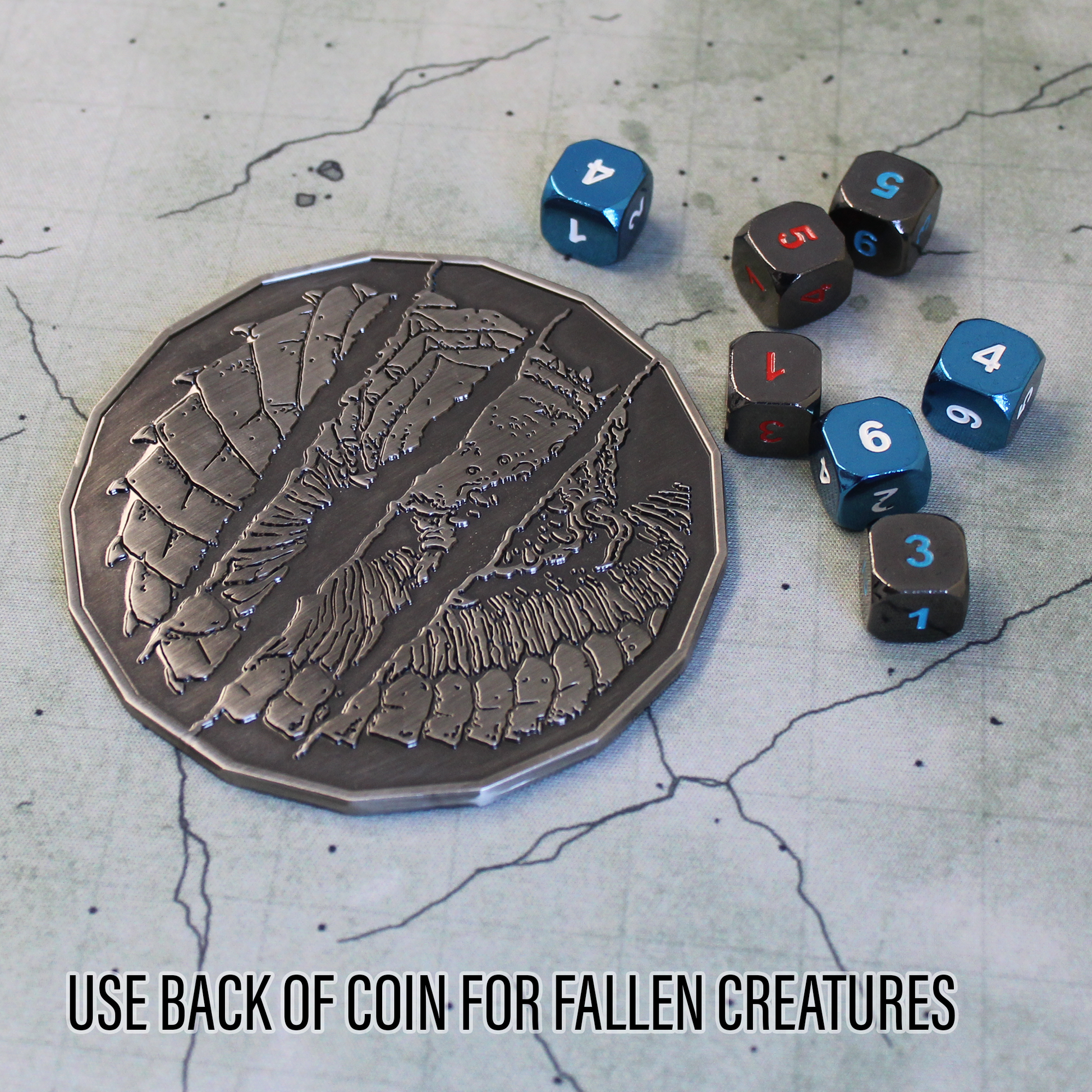 Back of the Purple Worm monster token showing scratched marks, used to indicate a defeated creature when flipped.