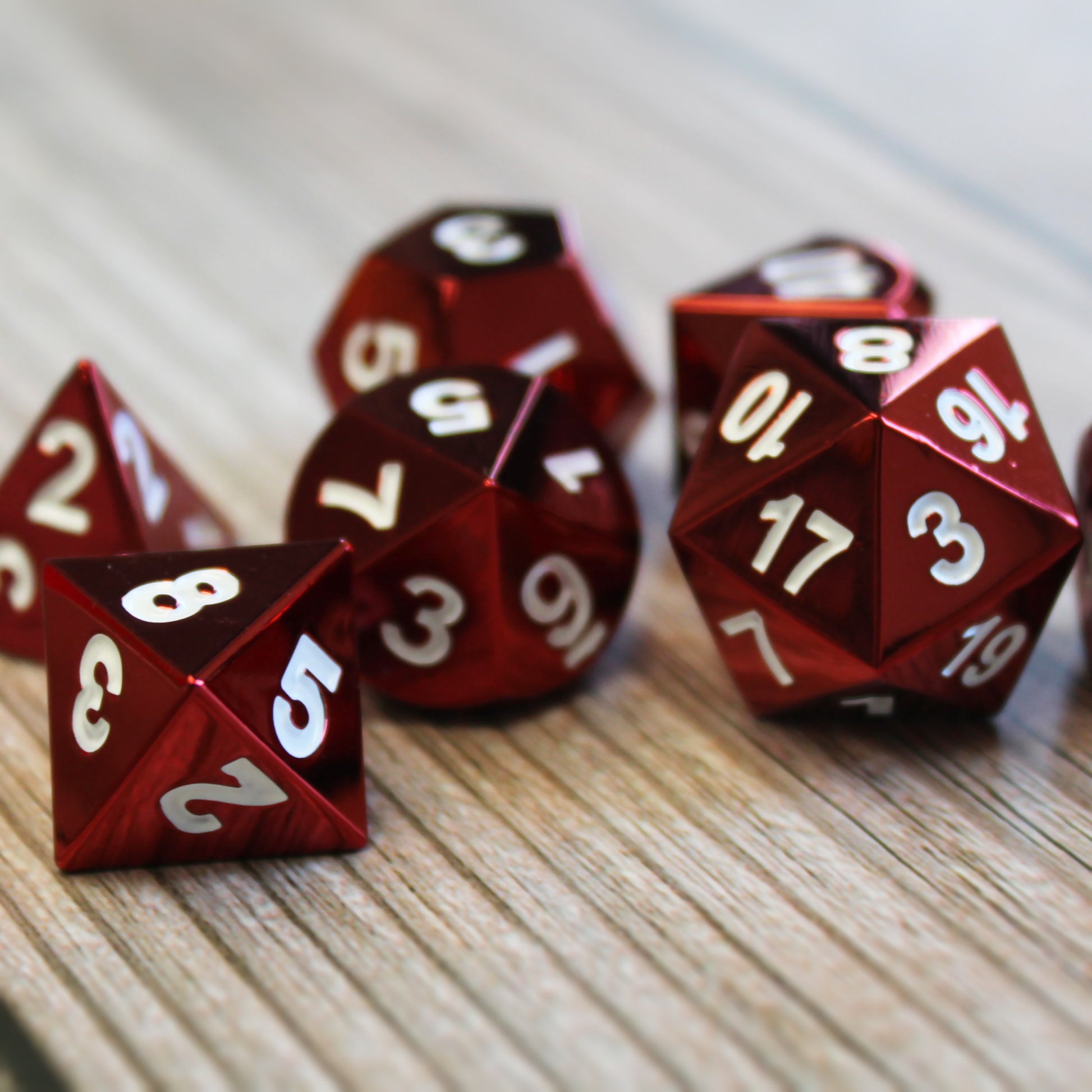 Radiant red dice set scattered on a wooden surface