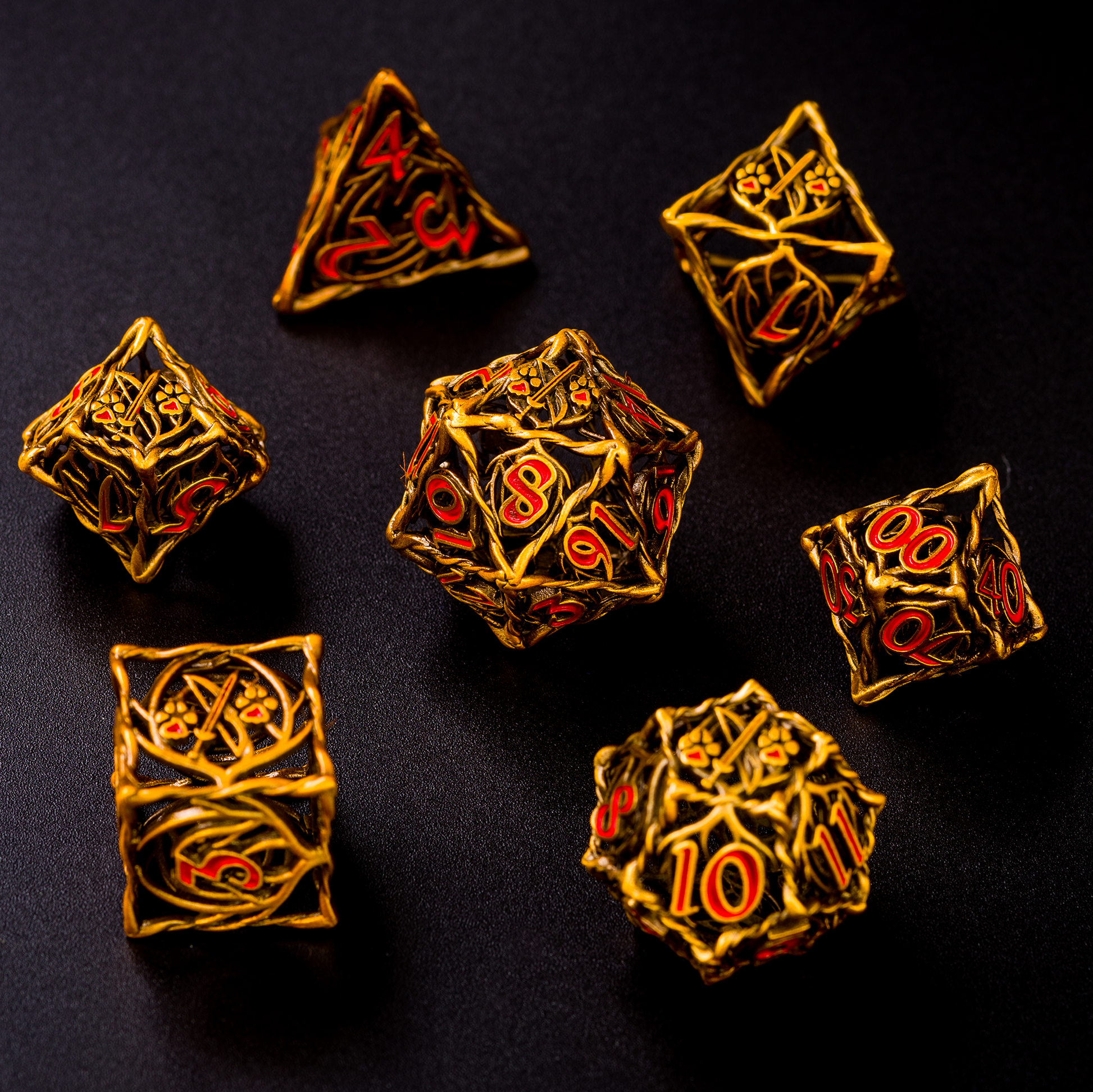 Gold Ranger dice with red inking on a black background. Dice are arranged with D20 in the center and the other 6 dice in a circle around it.