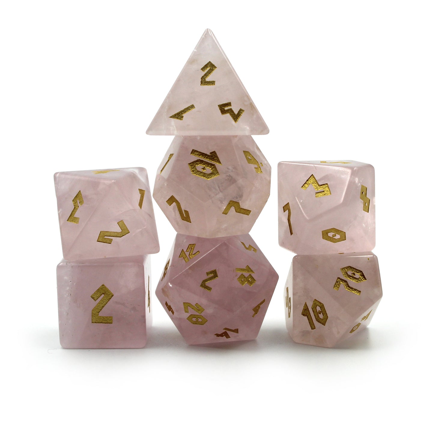 Stacked Rose Quartz dice set on a white background, showcasing the natural pink gemstone and gold numbering, great for any tabletop RPG.