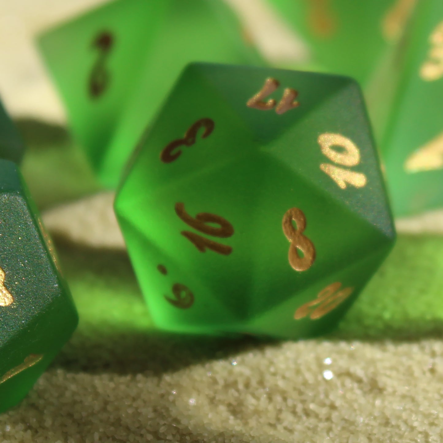Close-up of the D20, showcasing the frosted glass texture and detailed ocean-themed numbering.