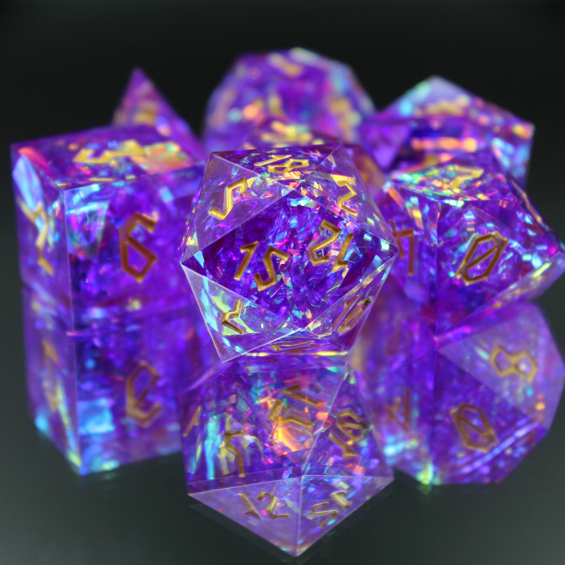 StarGlow Purple dice set arranged in a pile on a reflect surface.
