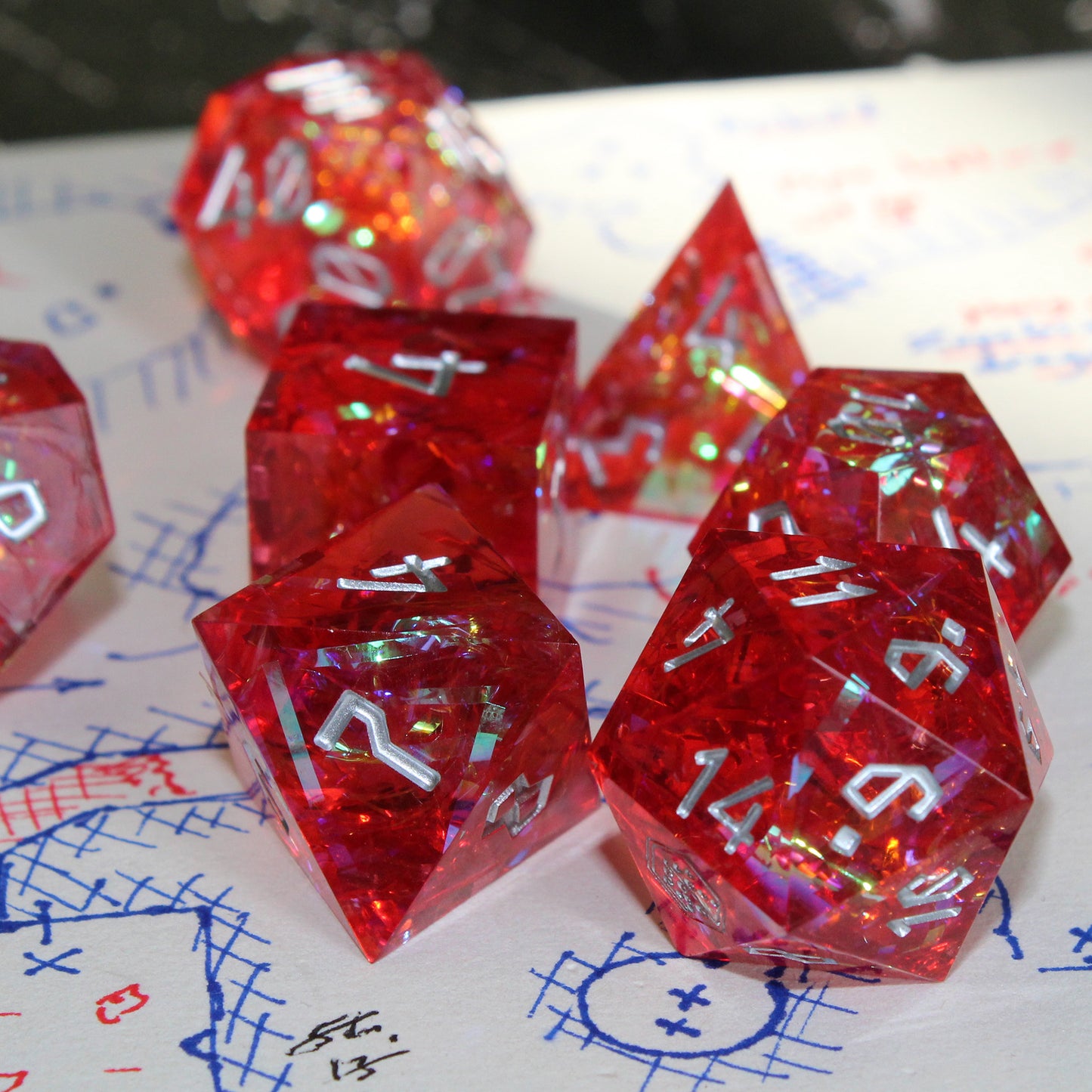 tarGlow Red dice set placed on a D&D dungeon map, perfect for fire elementals and forge worshipers in RPG gameplay.