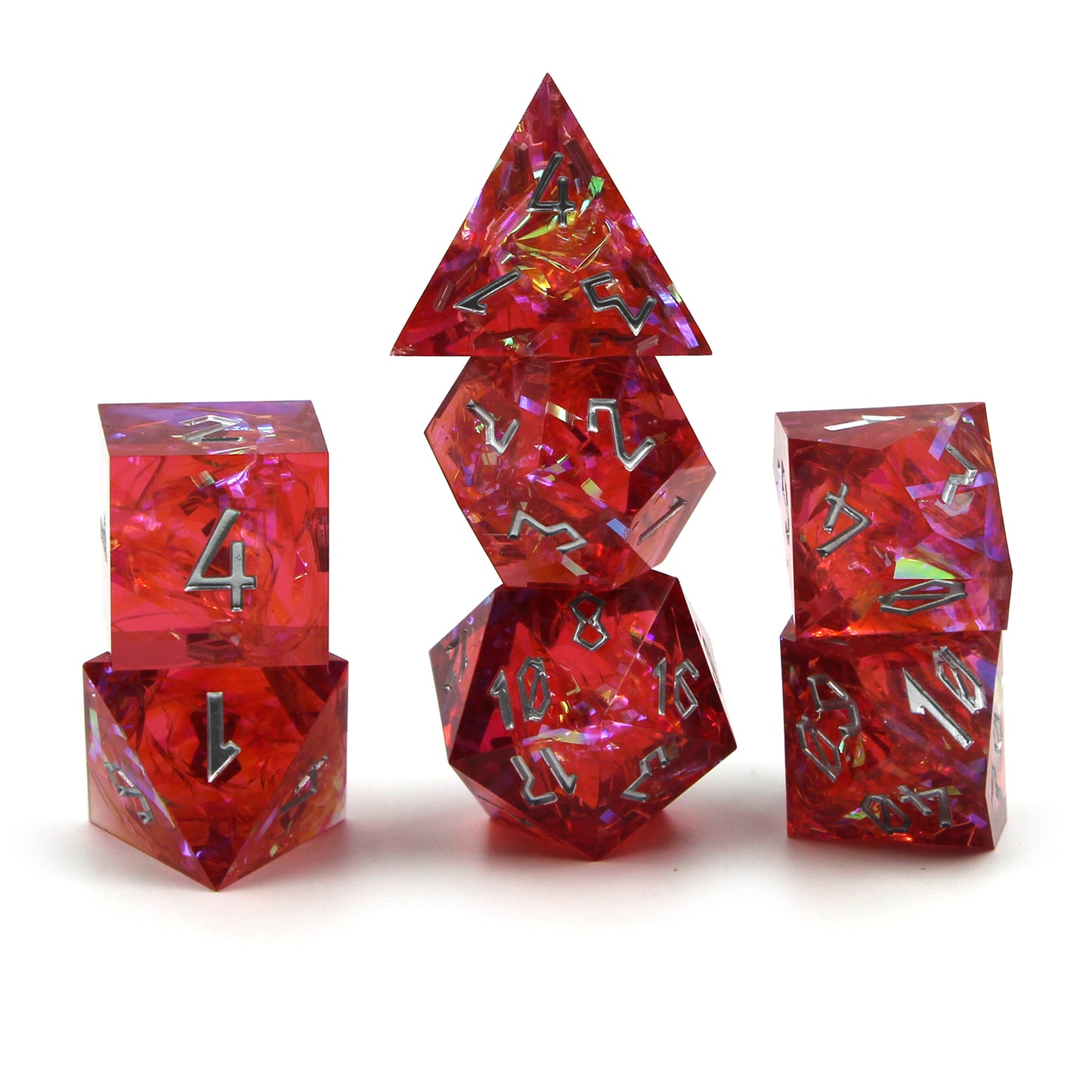 Stacked StarGlow Red resin dice set on a white background, featuring silver Roman-inspired numbering and translucent red resin.