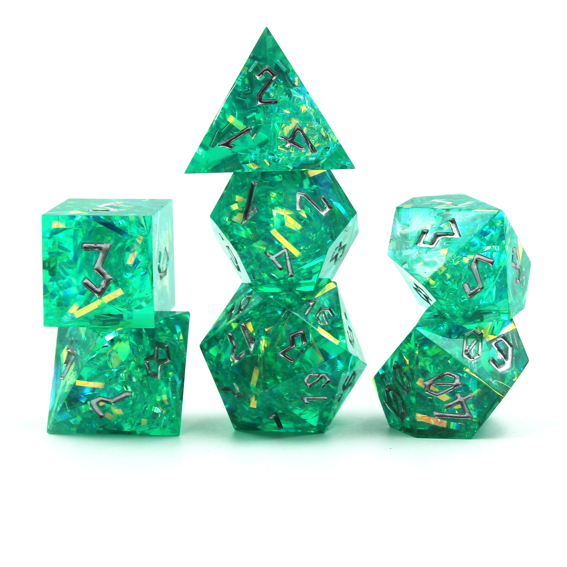 Stacked StarGlow Turquoise dice set, highlighting sharp edges and silver numbering.