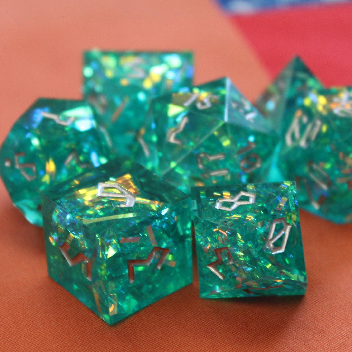 StarGlow Turquoise dice set ready for a Dungeons & Dragons session, featuring sharp edges and shimmering resin.