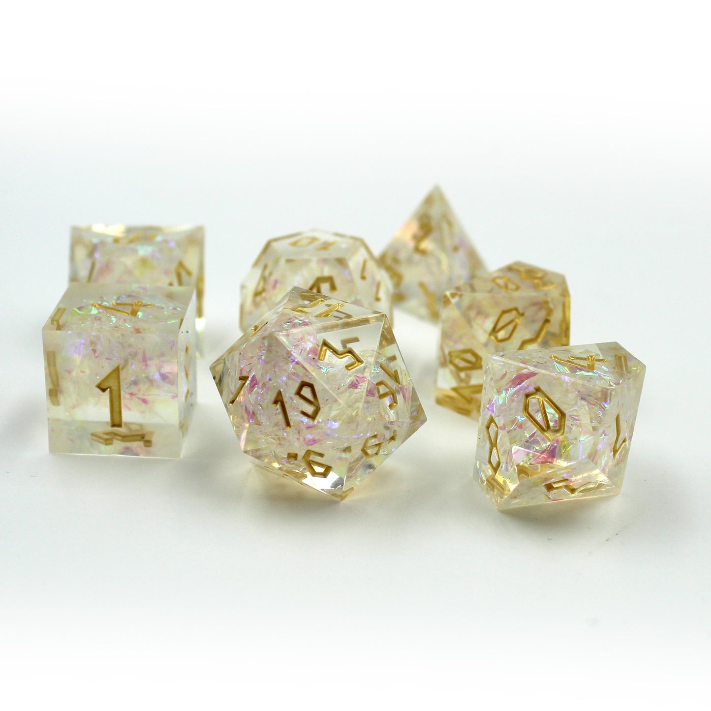 StarGlow White dice set arranged in a pile on a white background.