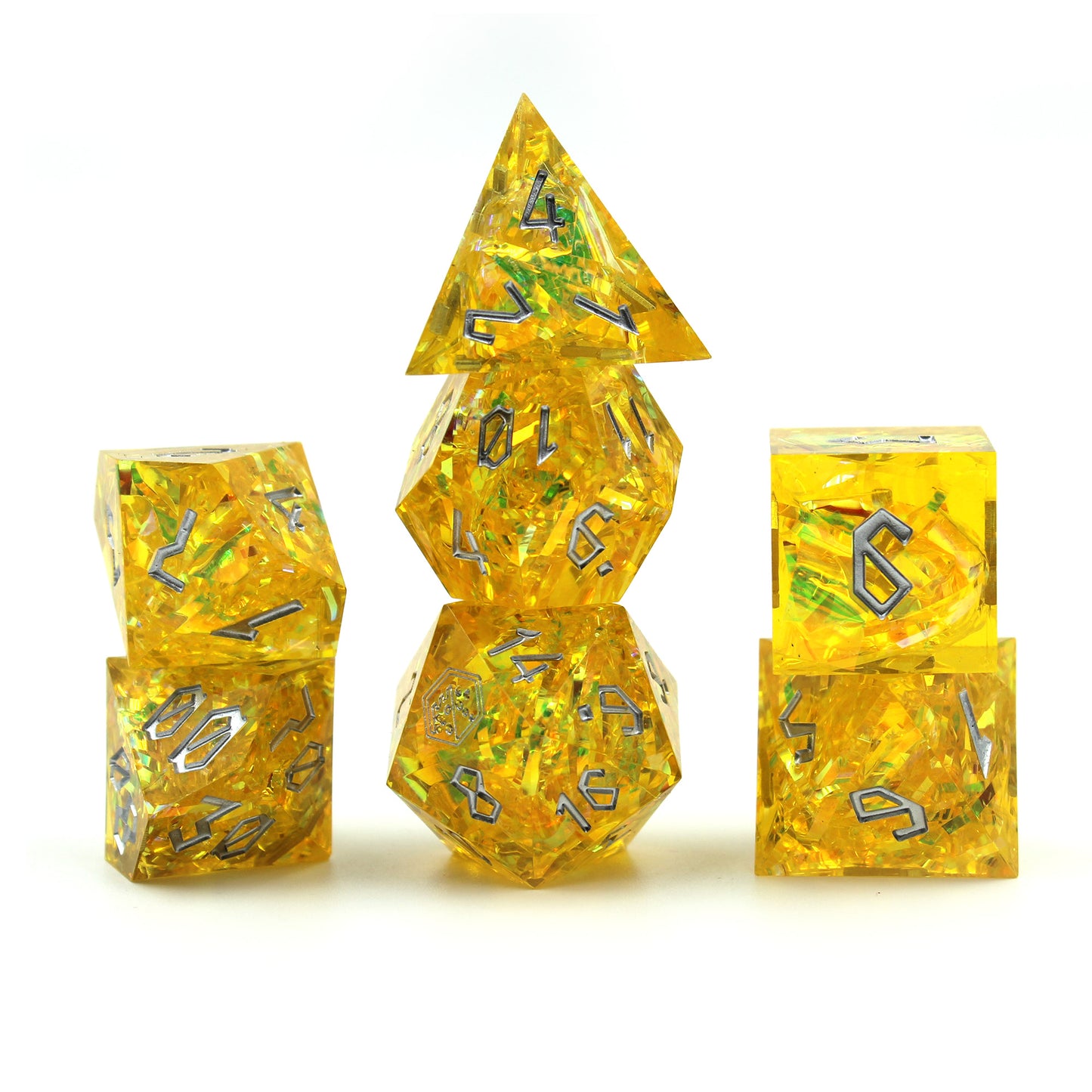 Stacked StarGlow Yellow resin dice set, showing the shifting iridescent colors within the translucent yellow resin.