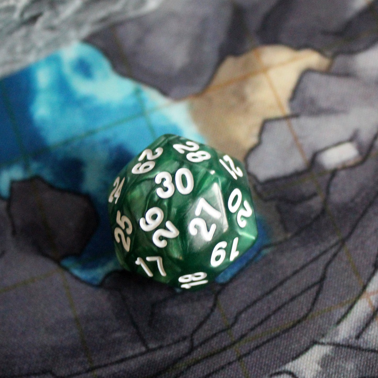 Unique 30-sided dice with pearlescent green design and white numbering.