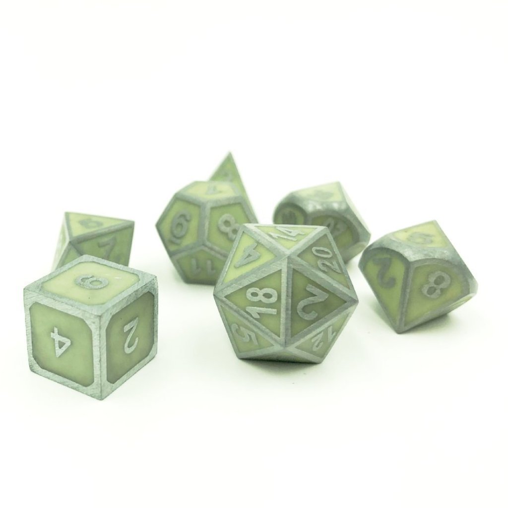 Imperial Glow in the Dark dice set scattered on a white background
