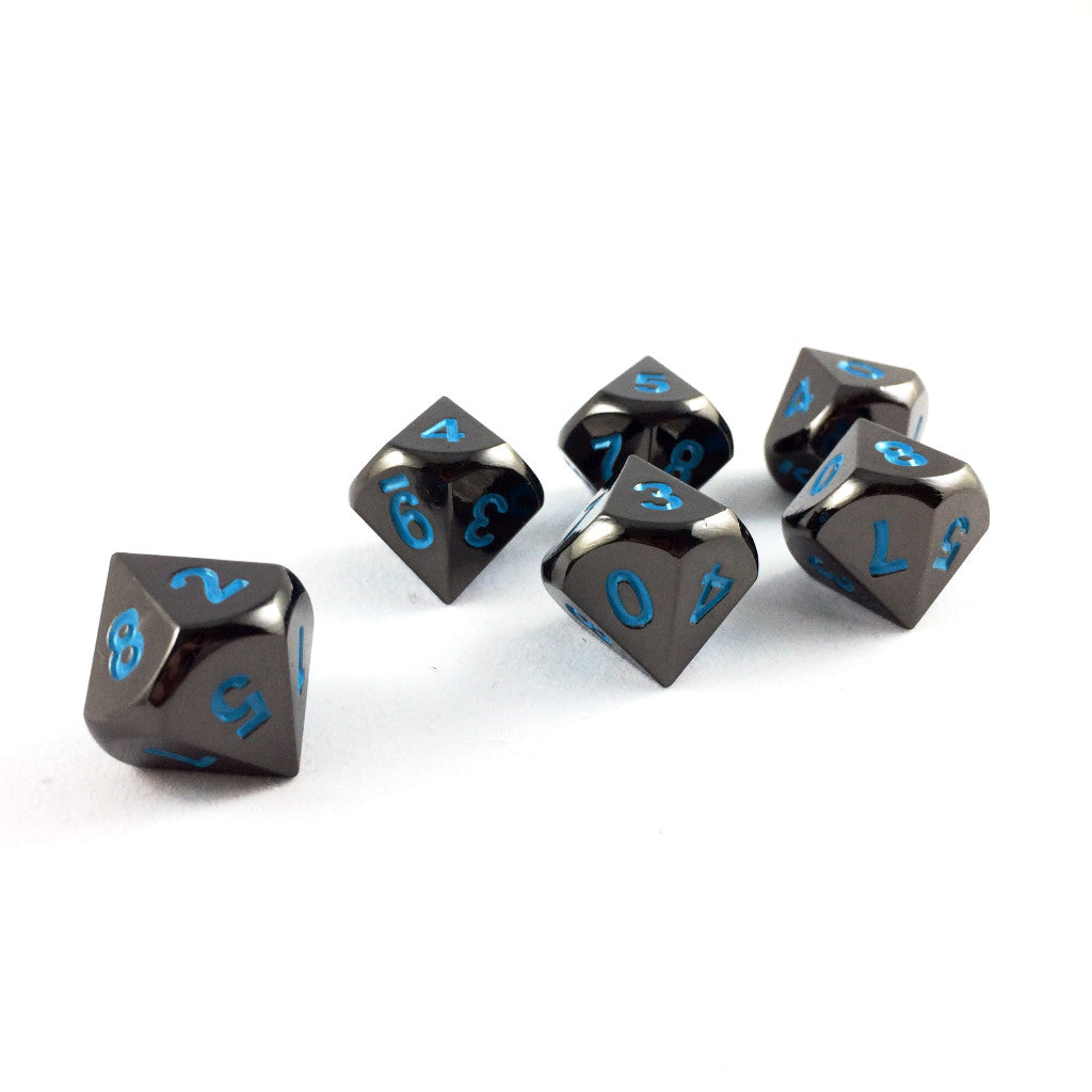Metal Black Frost D10 dice set scattered on a white background