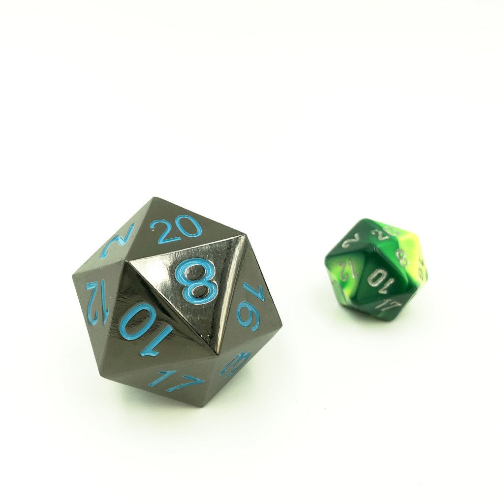 Jumbo Metal Frost D20 Compared to a Standard Plastic D20 for Scale, Displaying the 33mm Size Difference in Black Nickel-Zinc with Blue Numbers on a white background